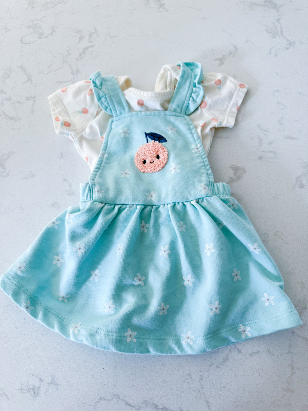 Pekkle- 6m- VGUC- light blue cloth overall dress with bodysuit and peach design