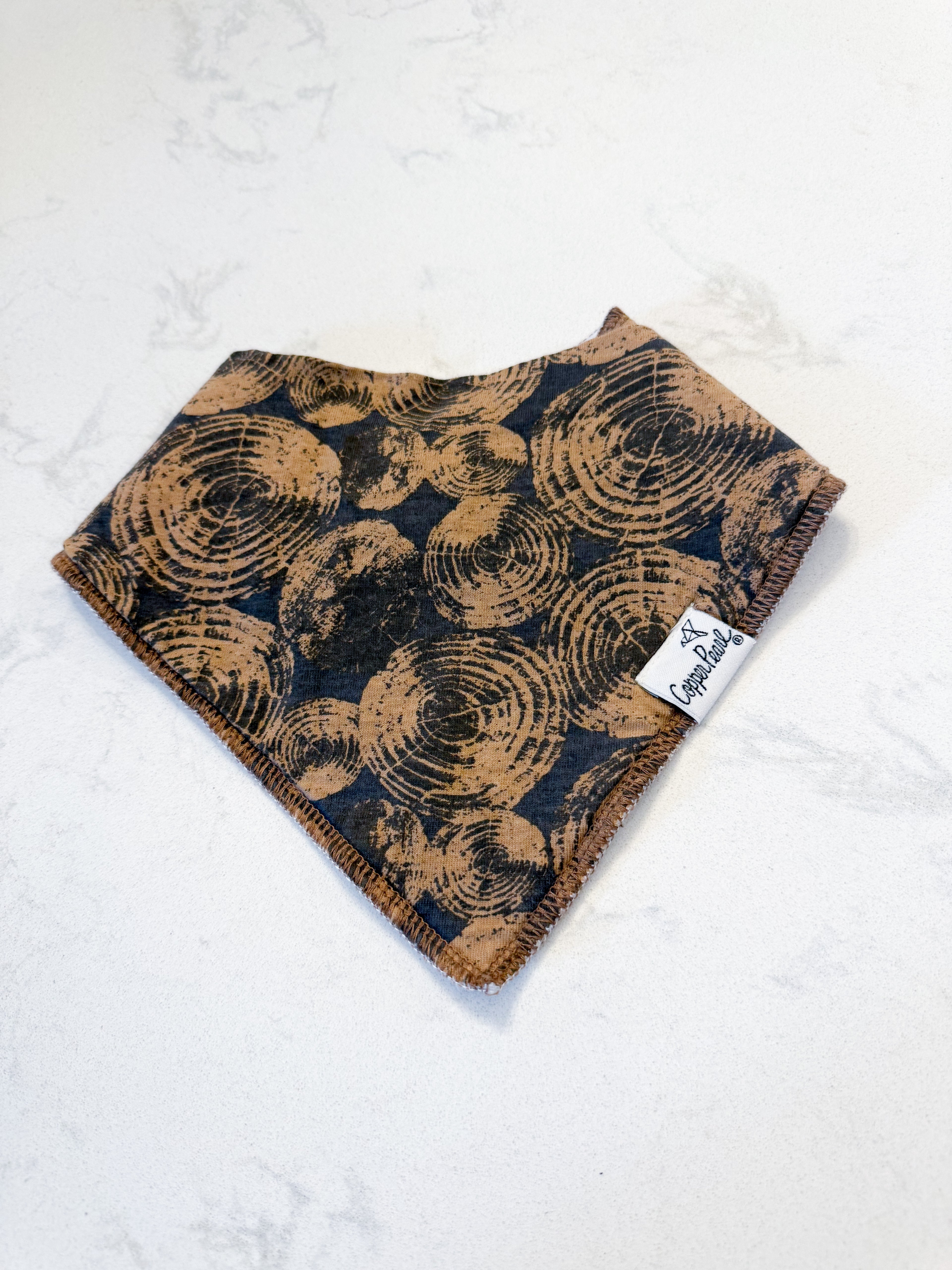 Copper Pearl- VGUC- drool bib- cut log pattern