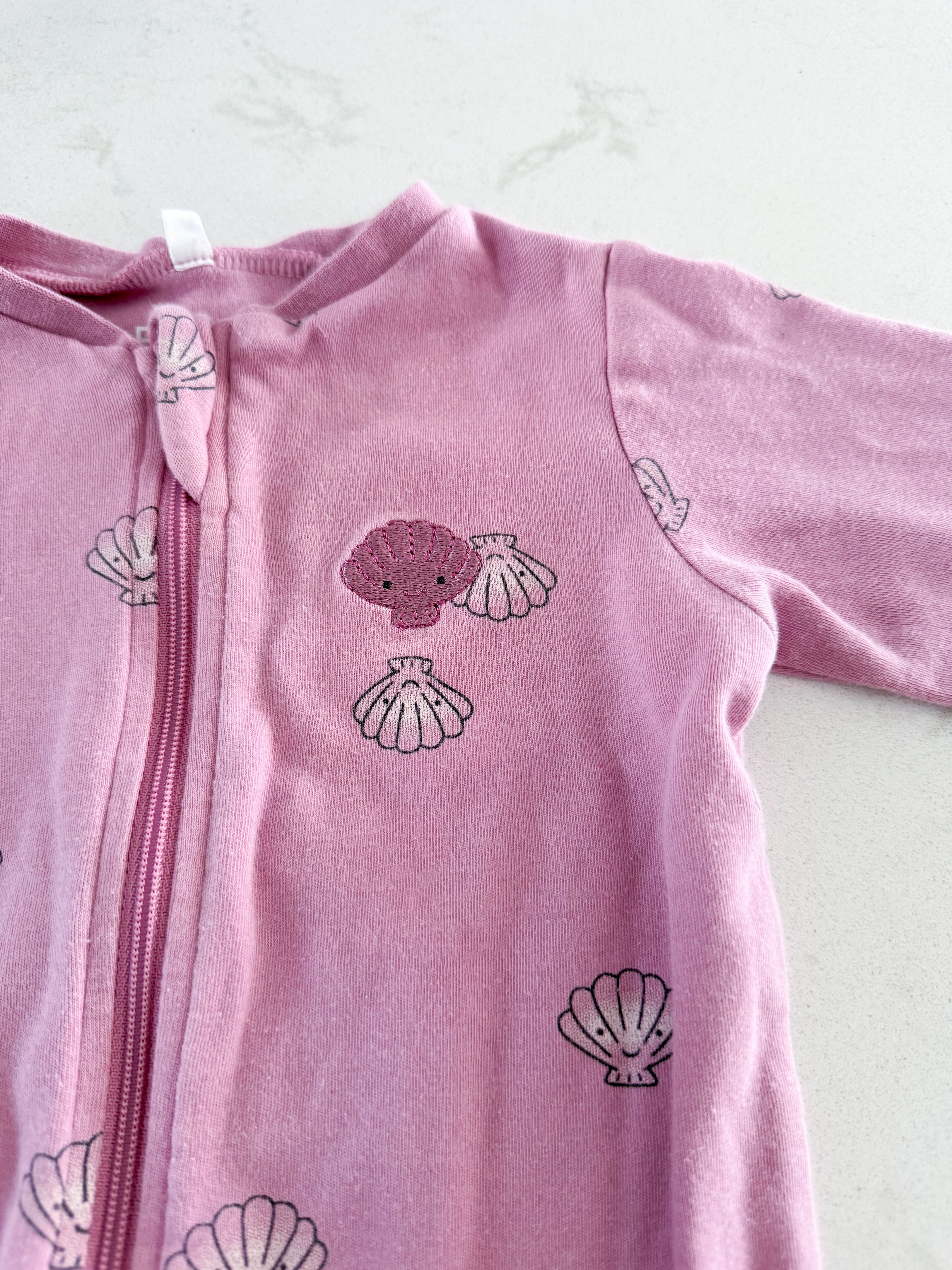 Pekkle- 6m- GUC- purple seashell footie jammies with embroidery