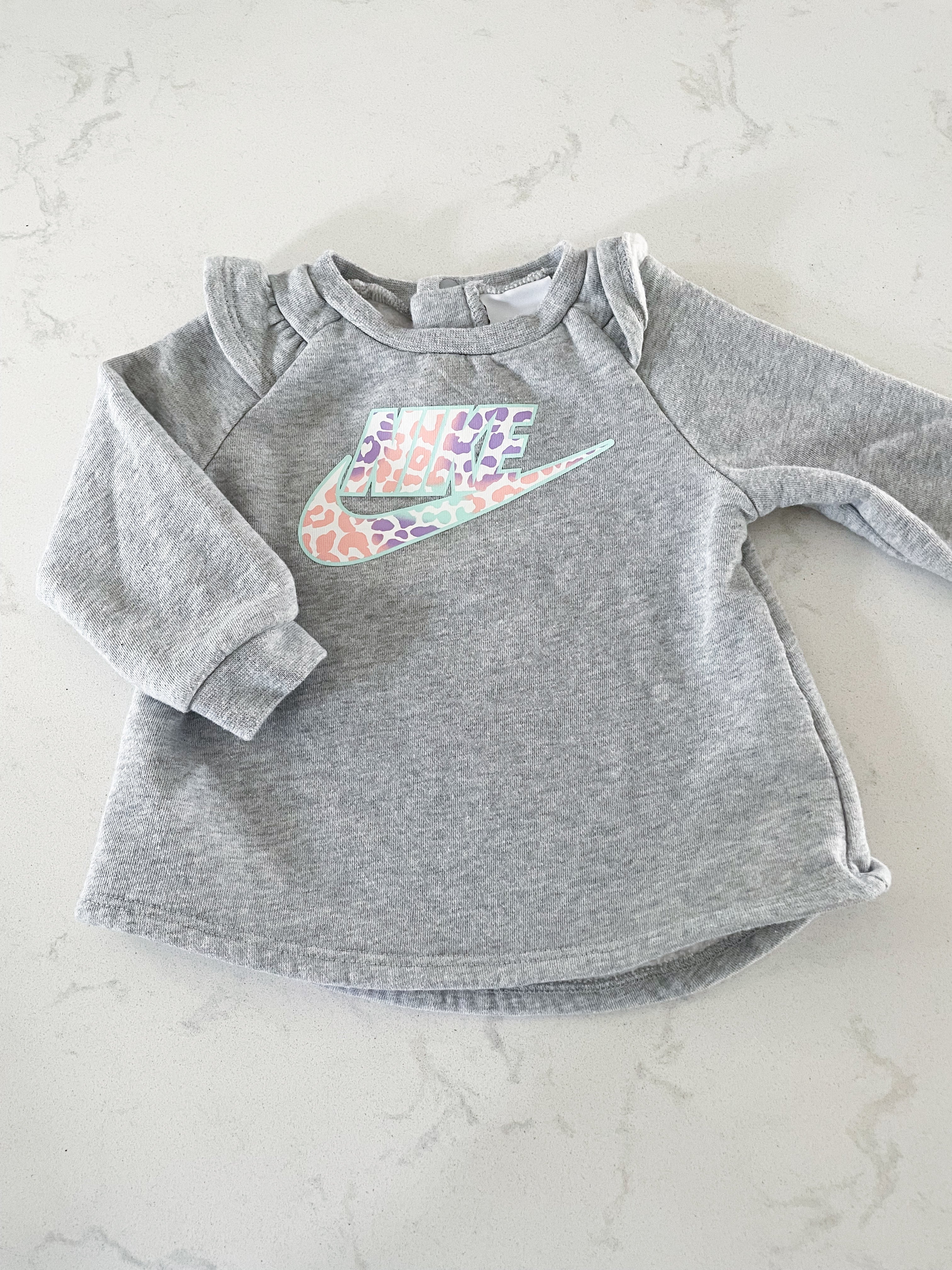 Nike- 9 months- crewneck sweater with ruffle shoulders