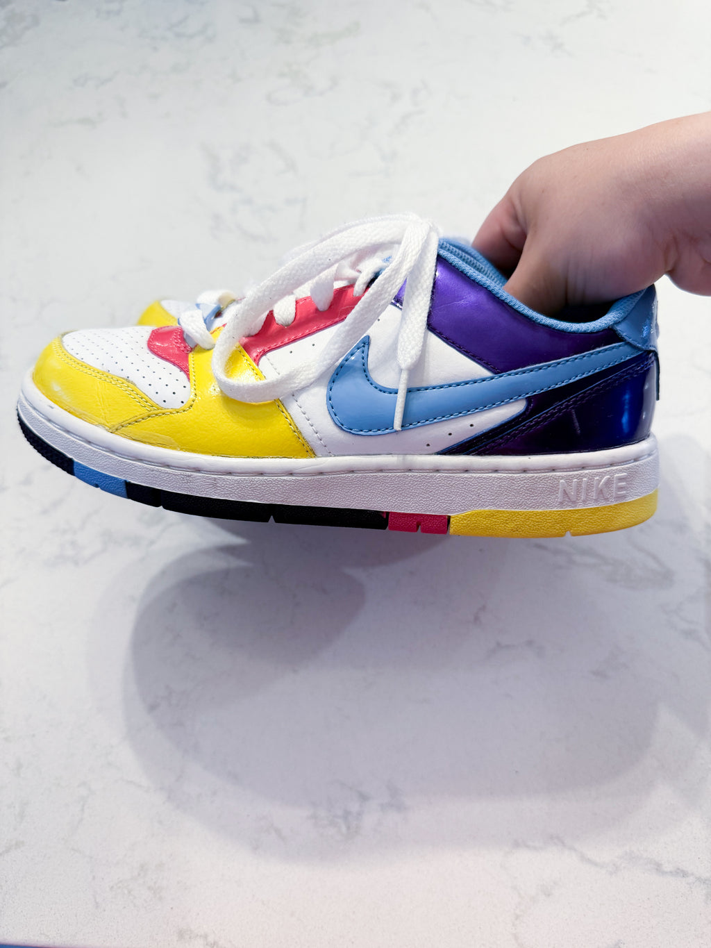 Nike- 4Y- GUC- White pink purple yellow and blue shoes with laces