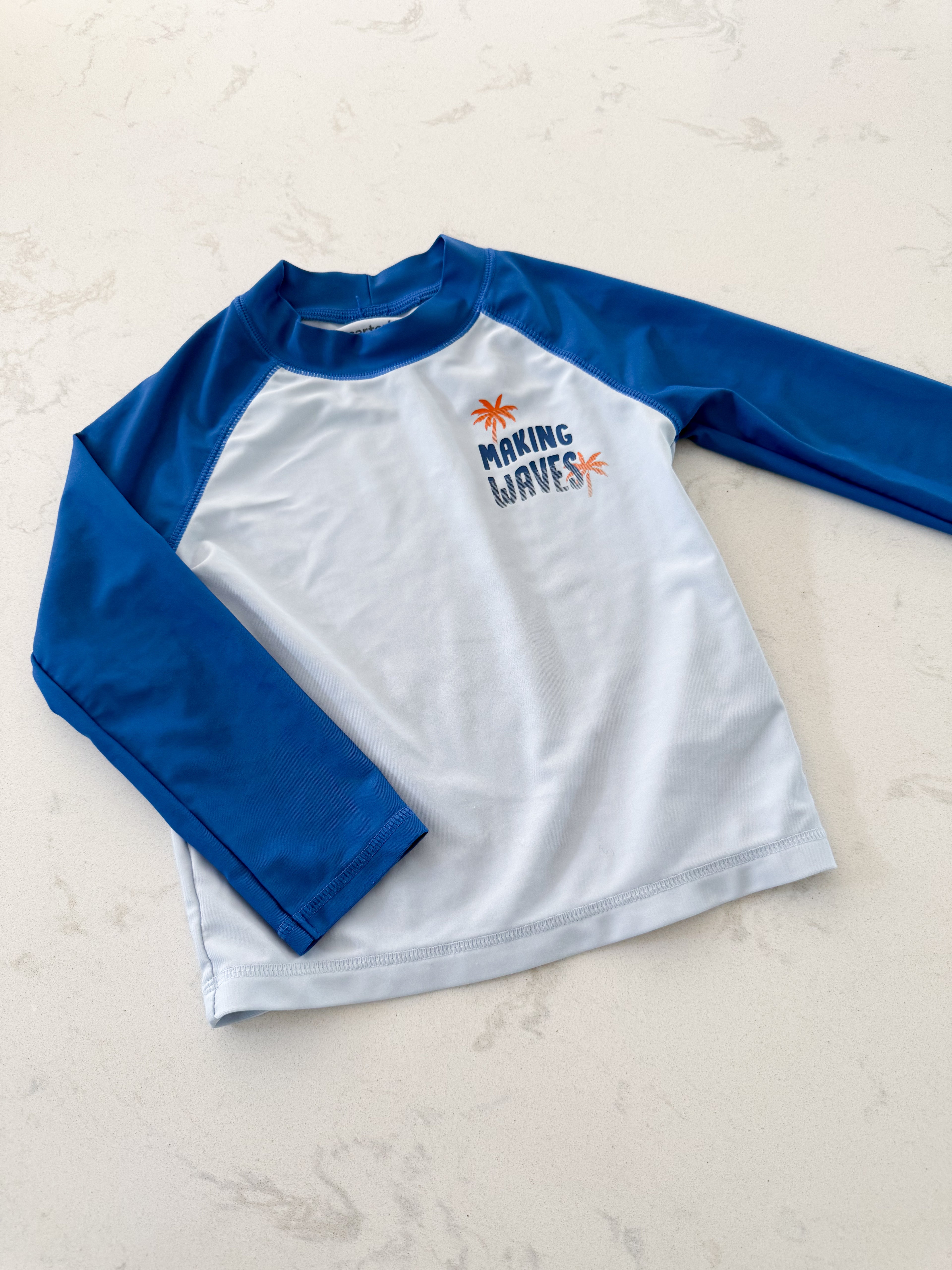 Carters- 3T- VGUC- blue rashguard with “making waves.”