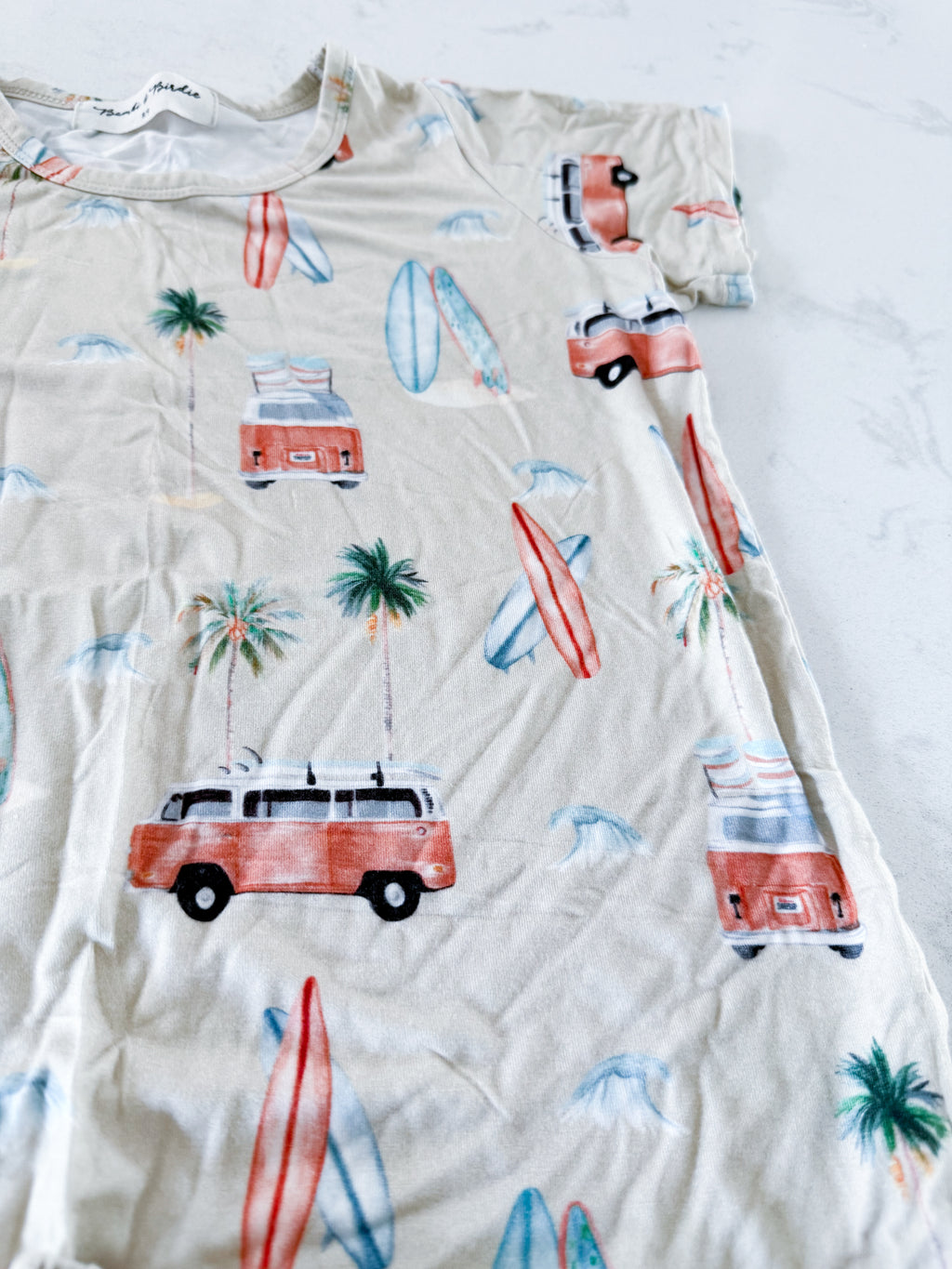 Bambi and Birdie- 8/9Y- VGUC- beige two piece bamboo shorts jammies with surfing graphics