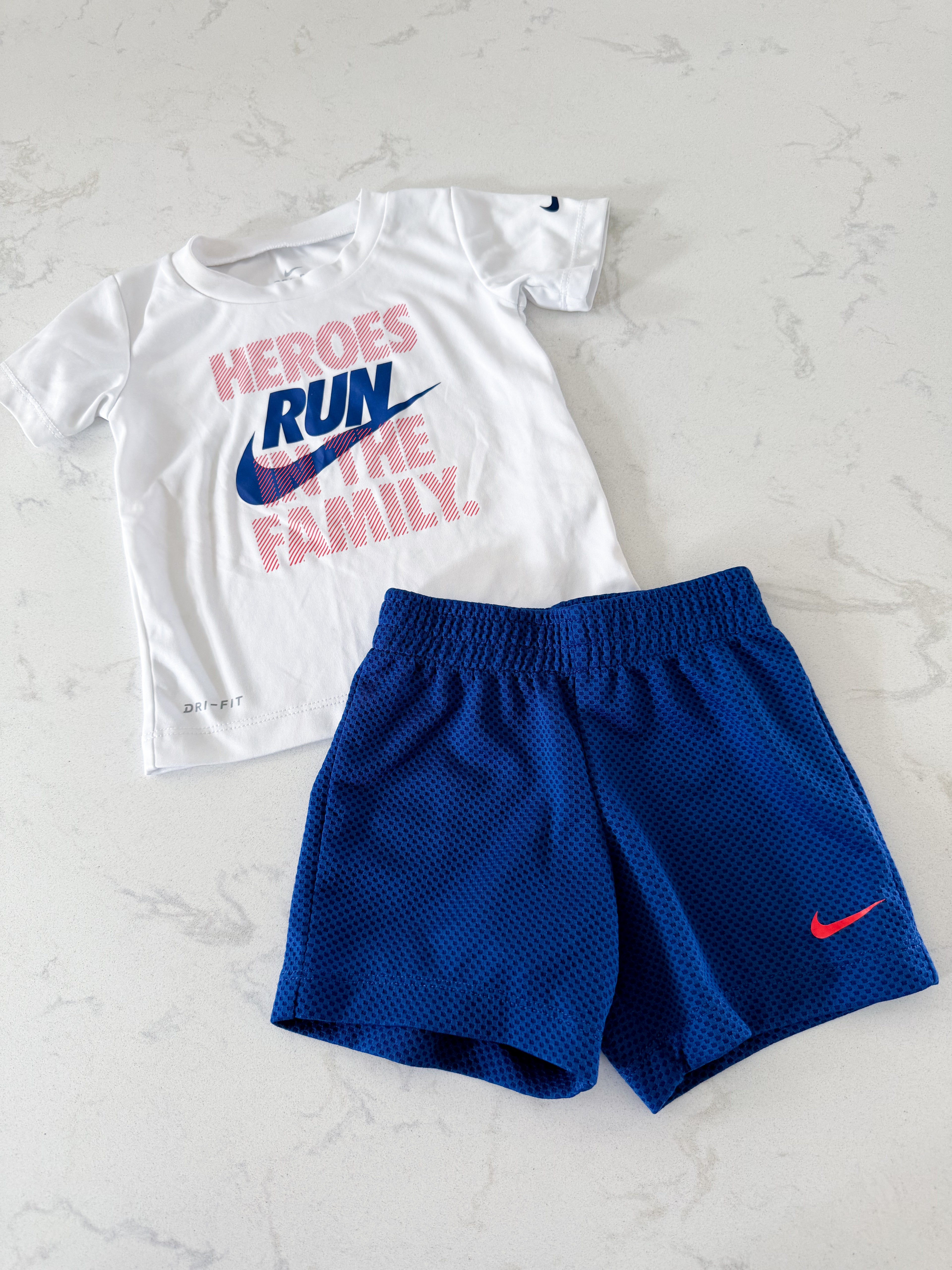Nike- 18m- VGUC- white athletic t shirt with blue shorts