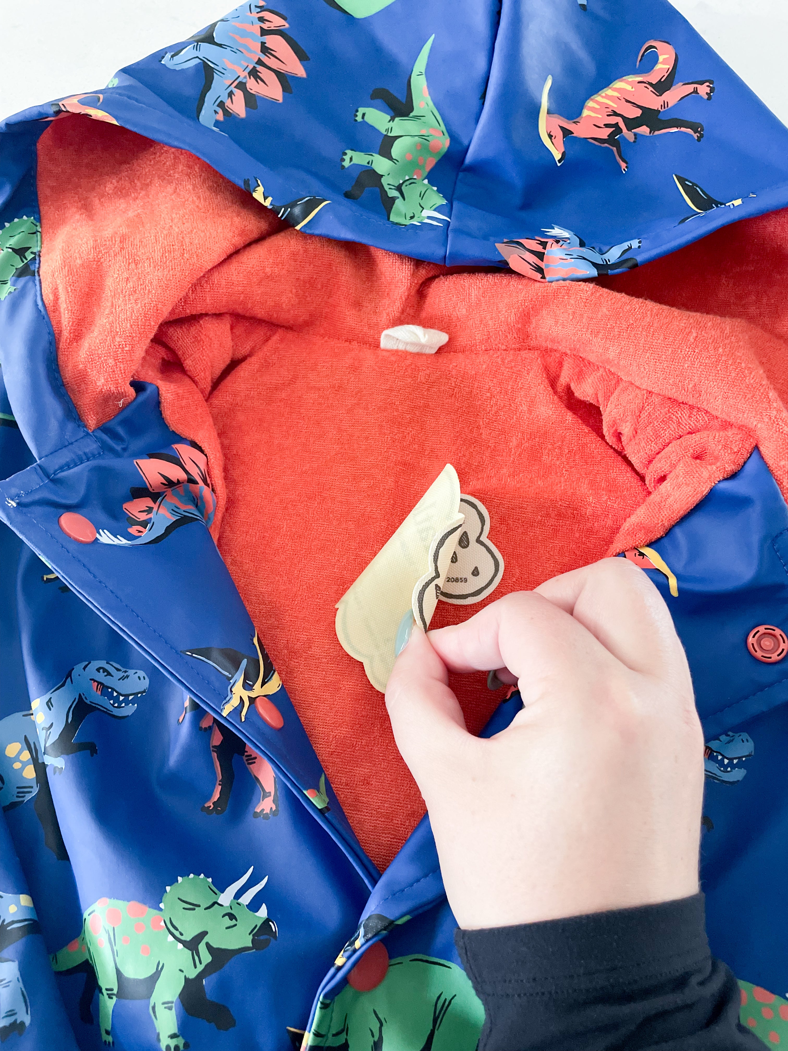 Hatley-4T-GUC-blue Rain coat with dinosaurs and Terry towel lining