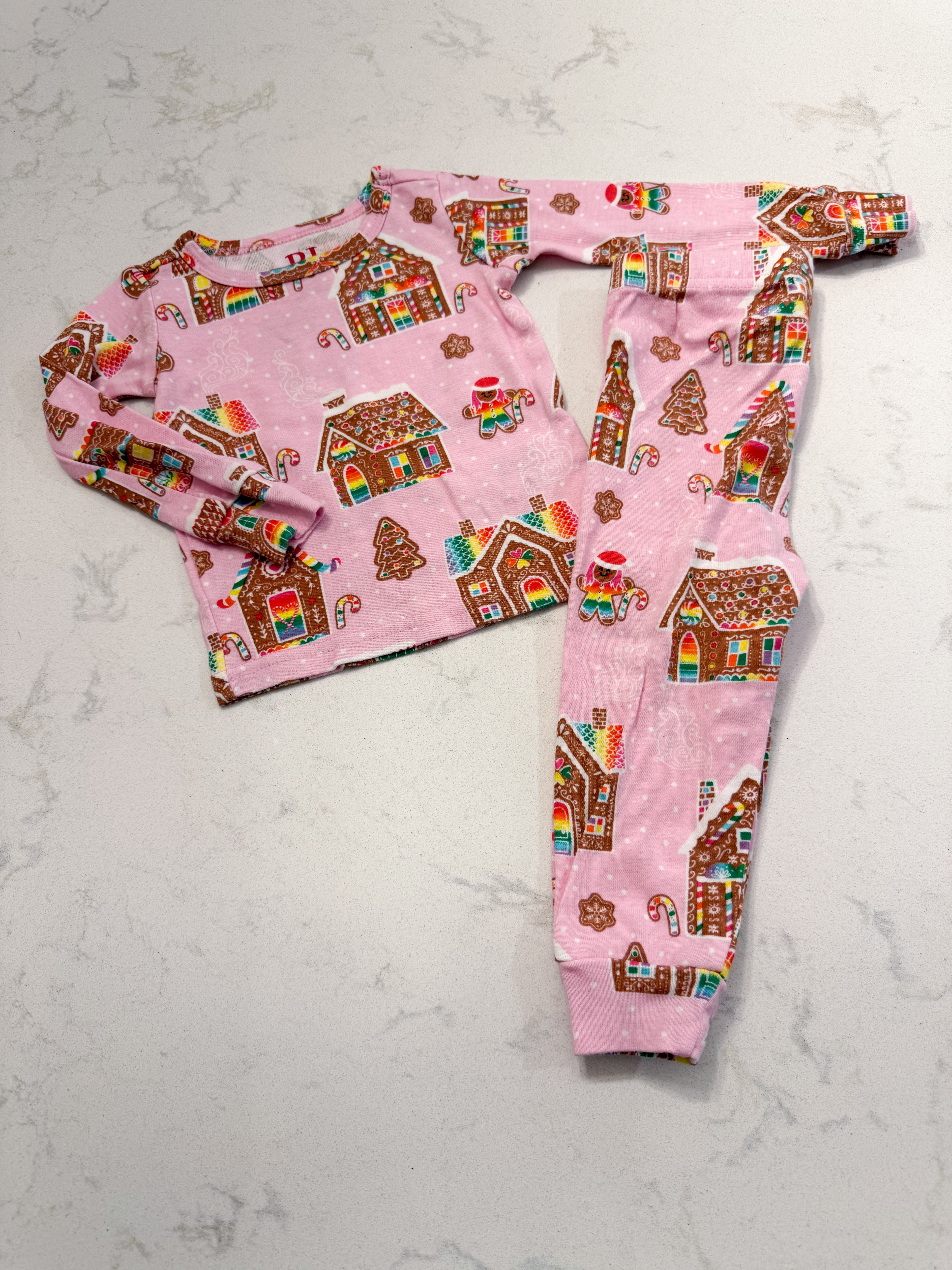 The Children’s Place- 6-9m- VGUC- pink long sleeve jammies with rainbow gingerbread houses
