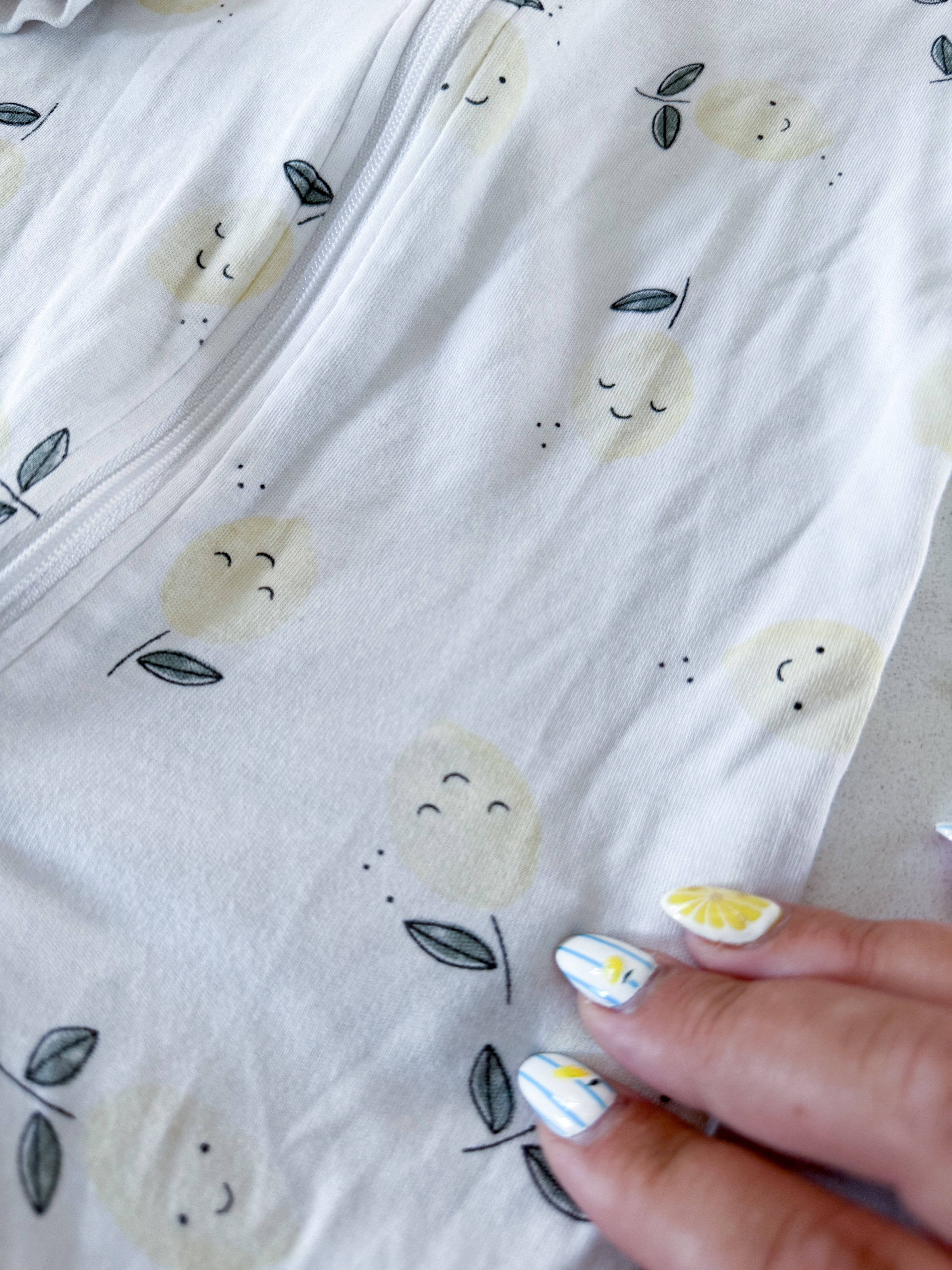 Pekkle- 9m- PLAY- white zip up footie Jammies with embroidered lemon