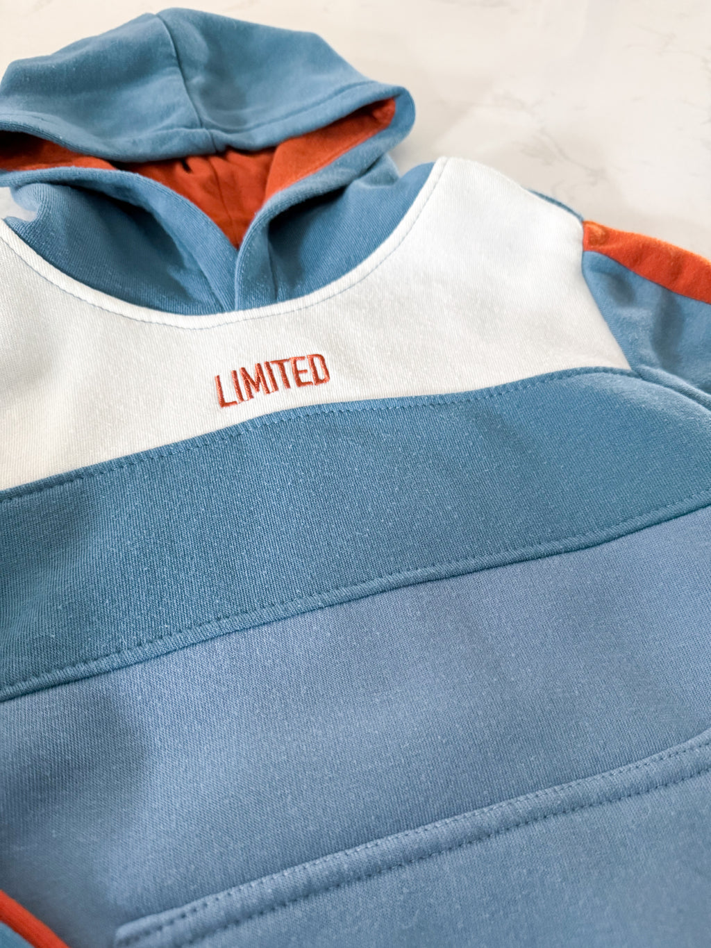 Sovereign State- 7Y- GUC- blue and dark orange hoodie with embroidered “limited”