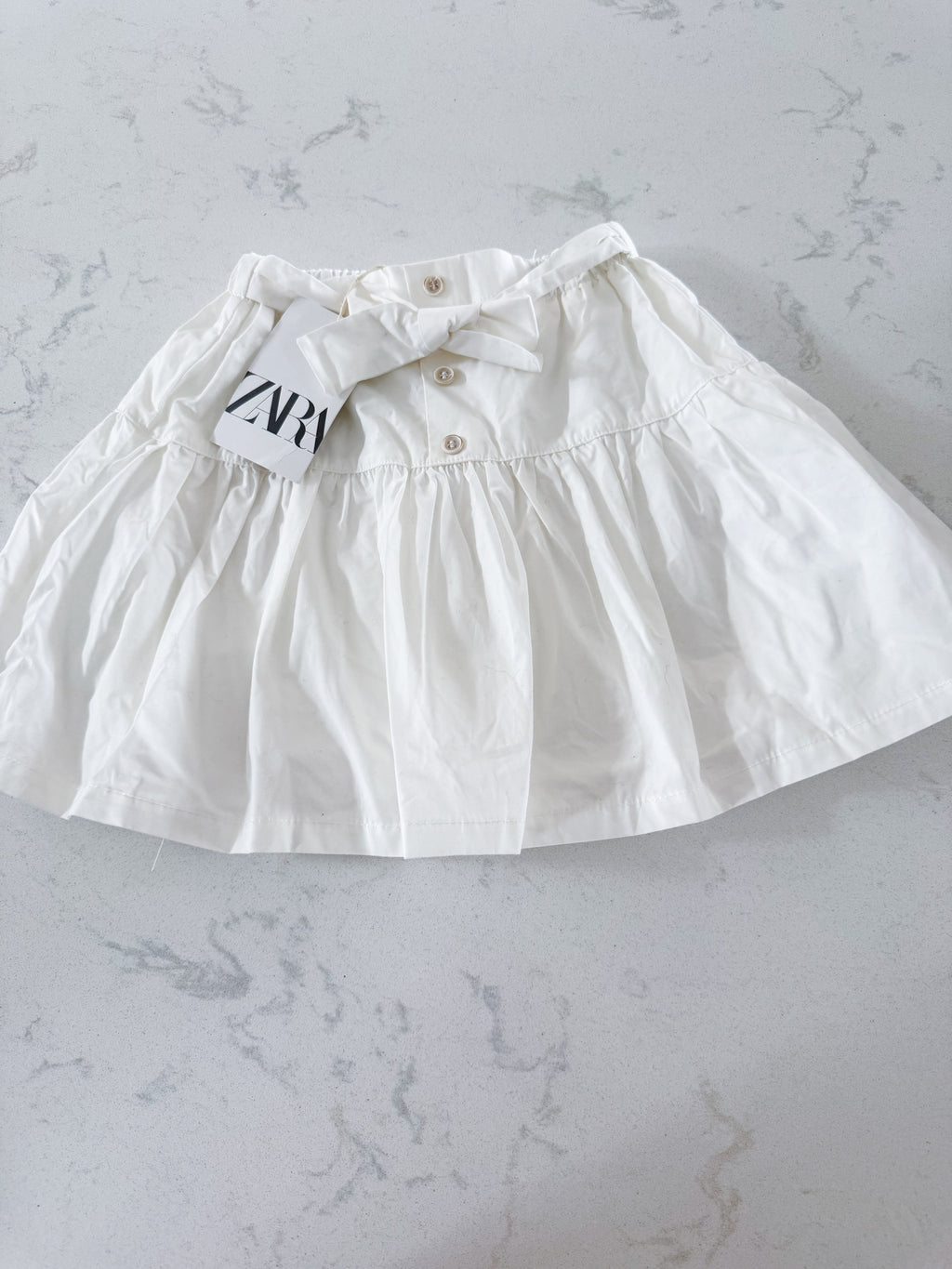 Zara- 4-5Y- BNWT- white skirt with bow