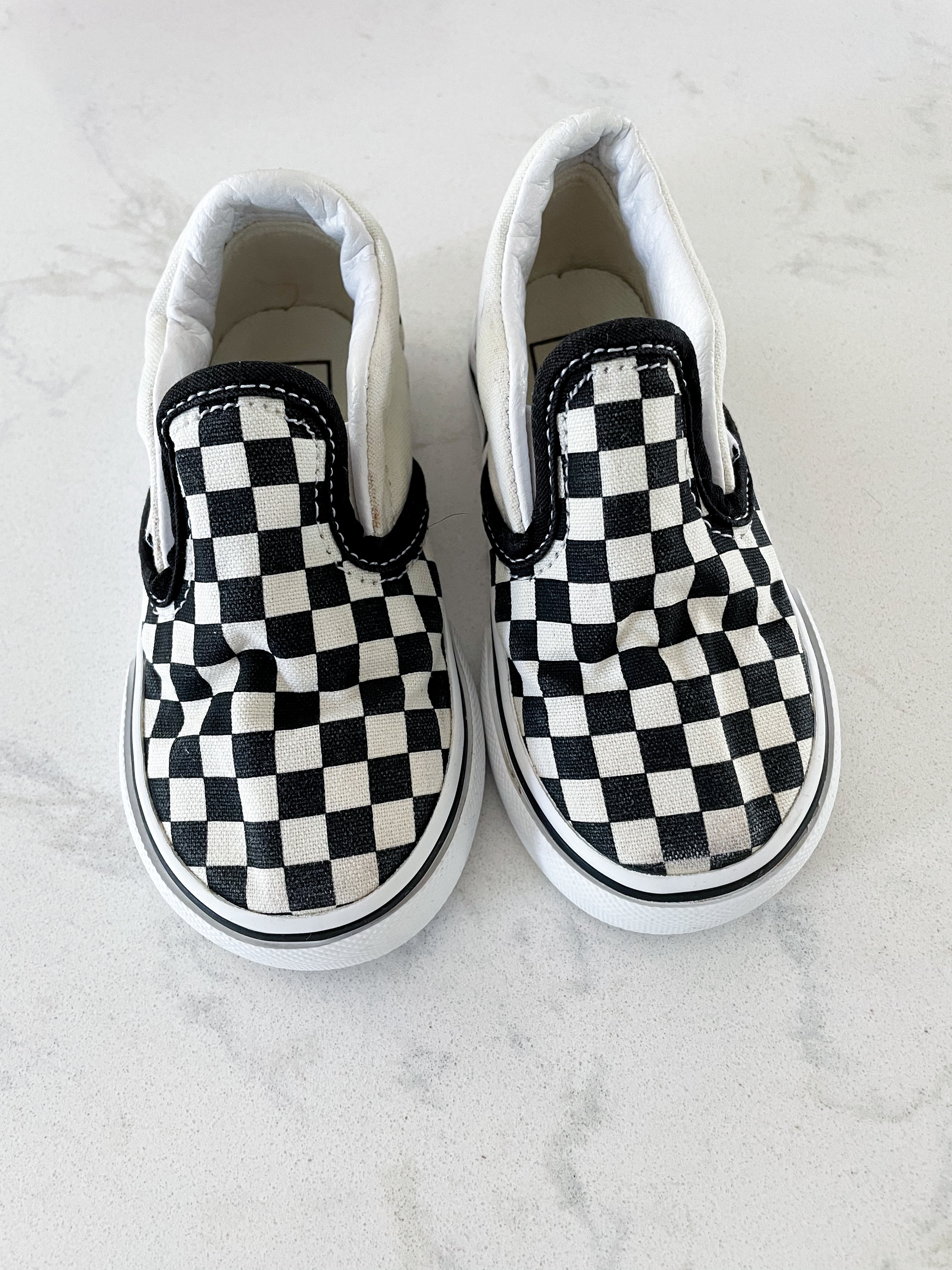 Vans- 6C- slip on black and white checkered shoes