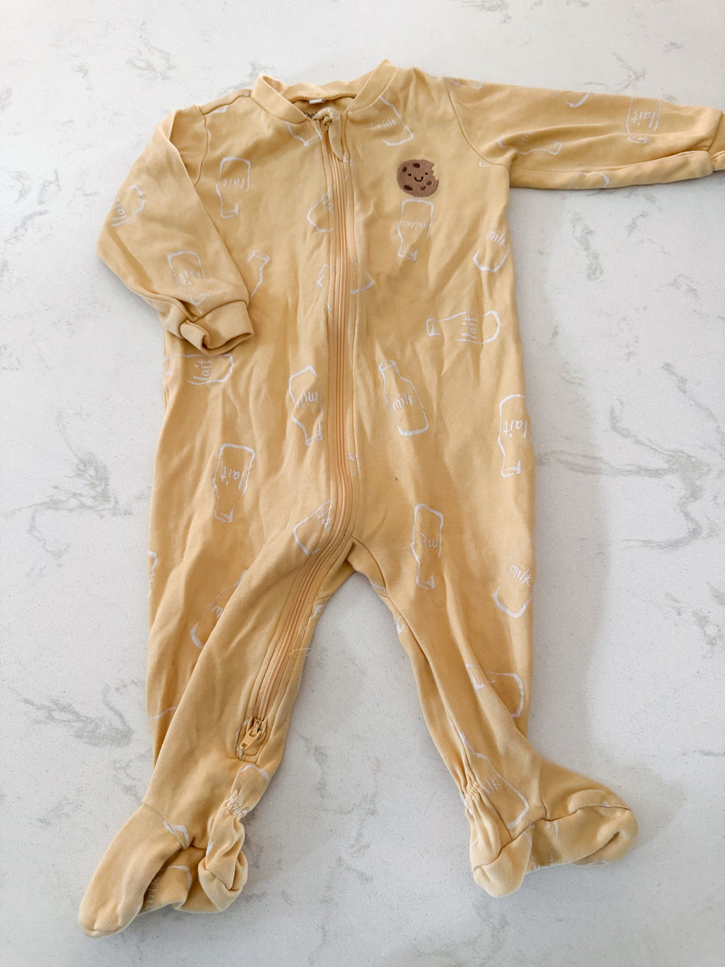 Pekkle- 9m- Play- yellow footie Jammies with embroidered cookie