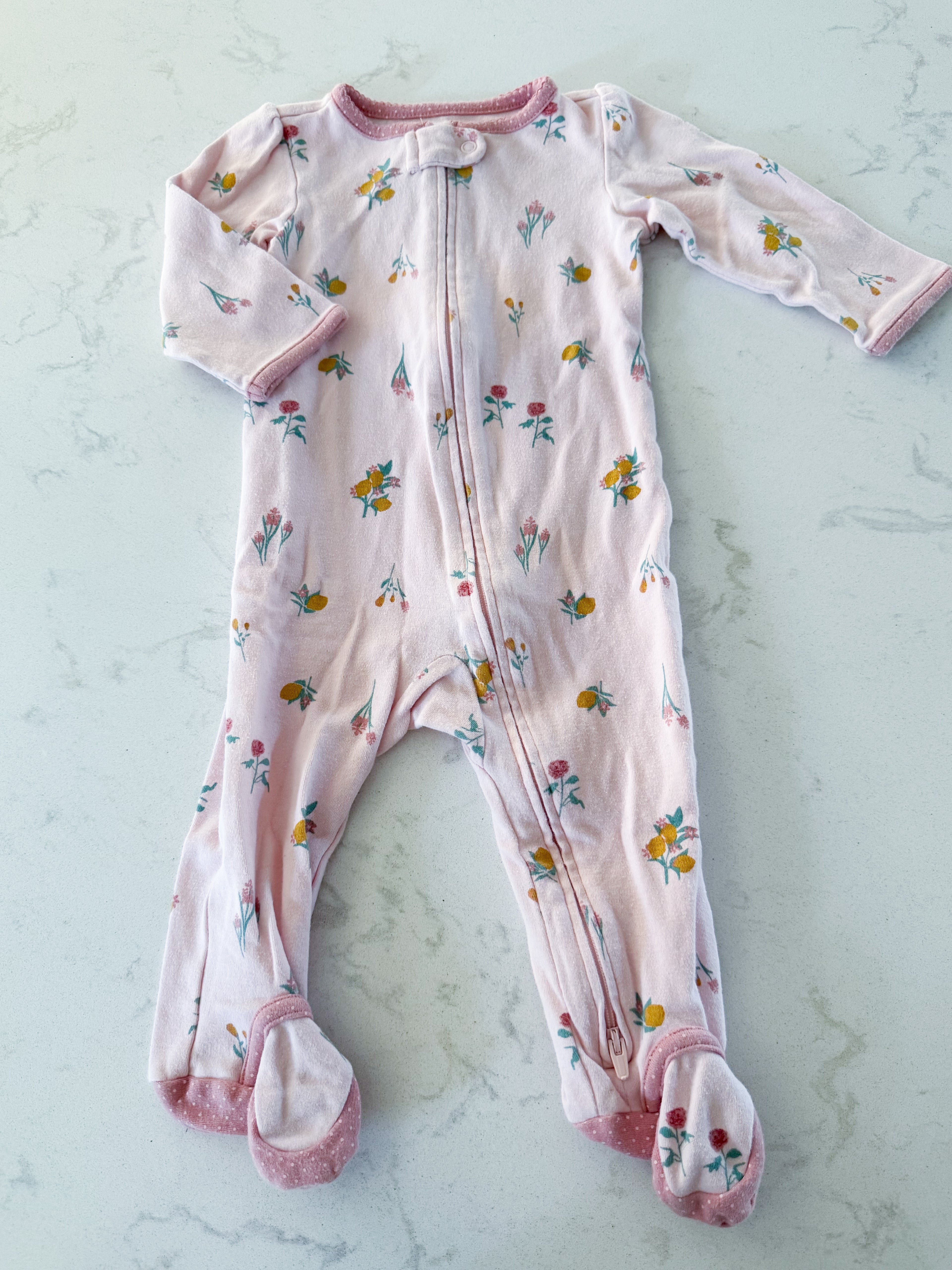 Carter’s- 6-9m- GUC- pink footie pajamas with small florals