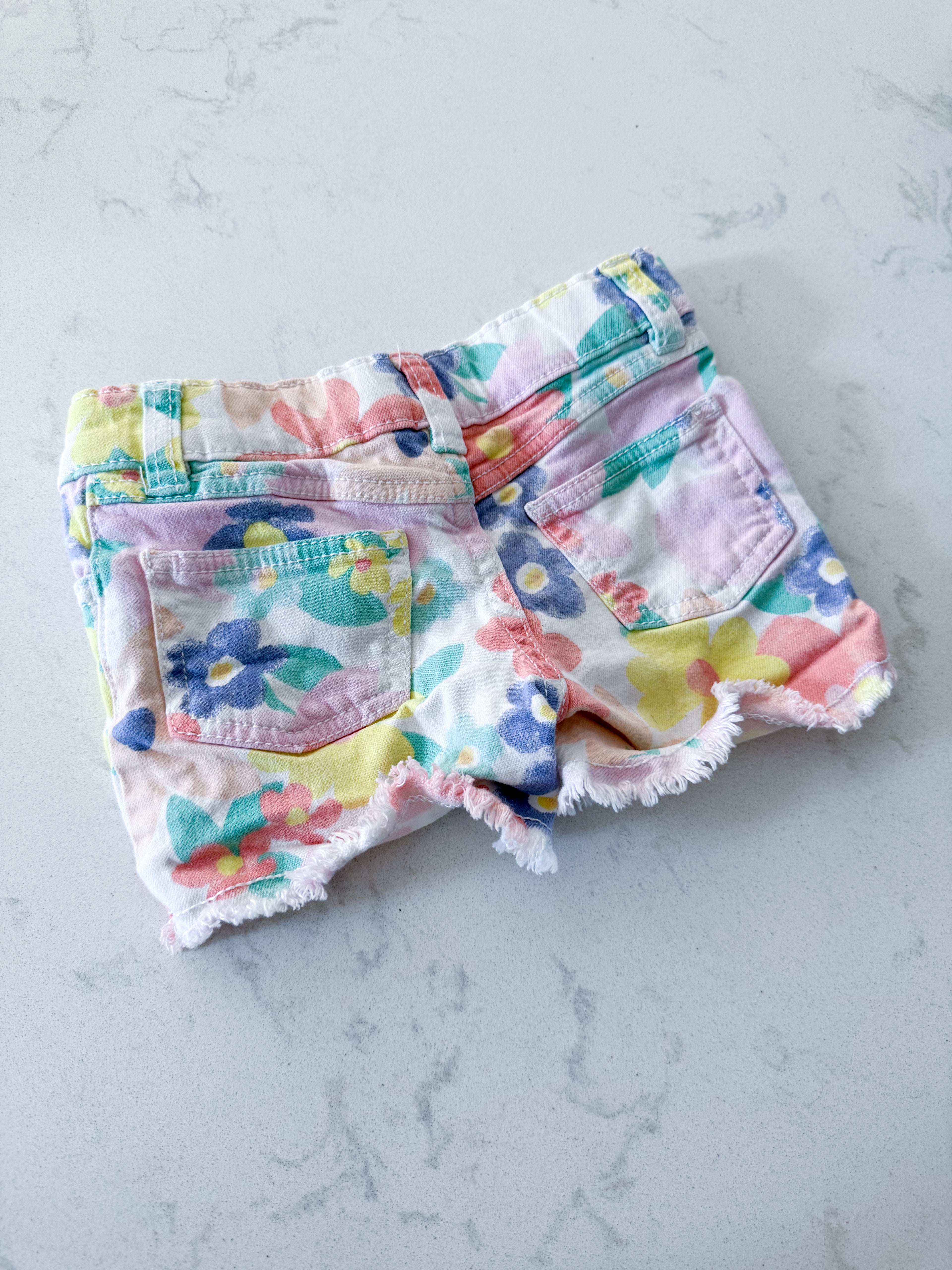 Carters- 4T- GUC- colourful floral Jean shorts