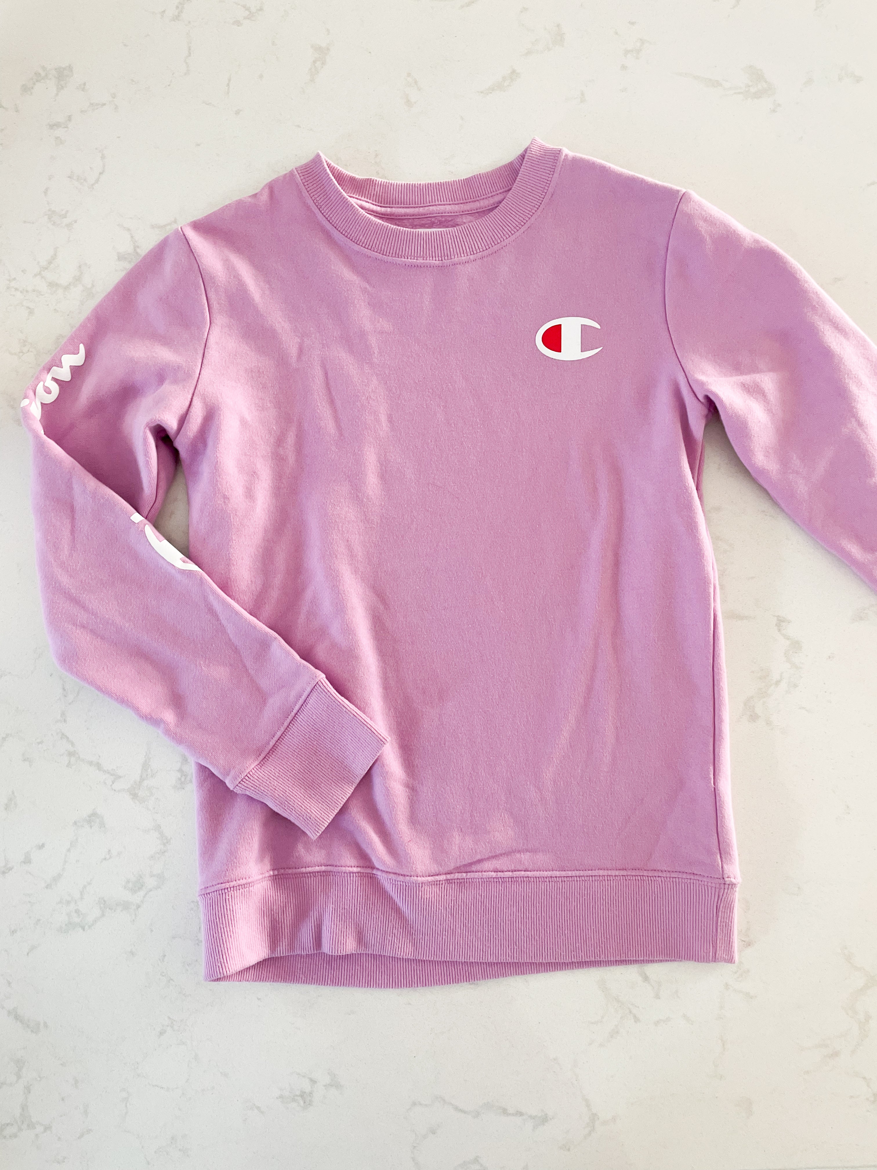 Champion-10-12Y- GUC- pink long sleeve sweater