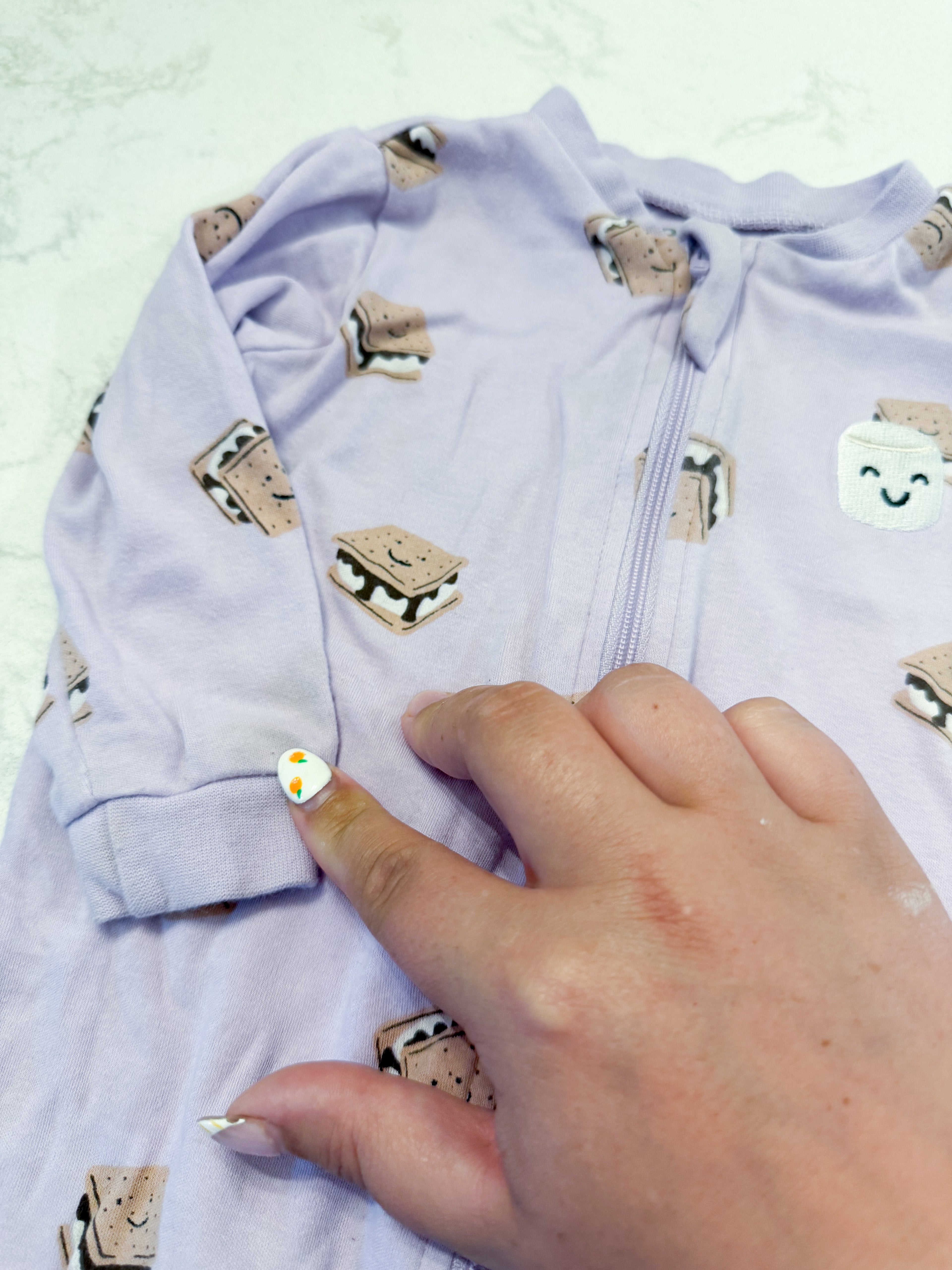 Pekkle- 9m- PLAYY- light purple footie pajamas with s’mores pattern