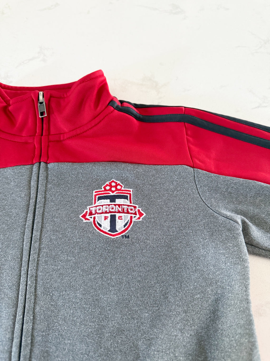 Adidas- fits 6-7Y- VGUC- grey and red Toronto FC athletic zip up with embroidered logo