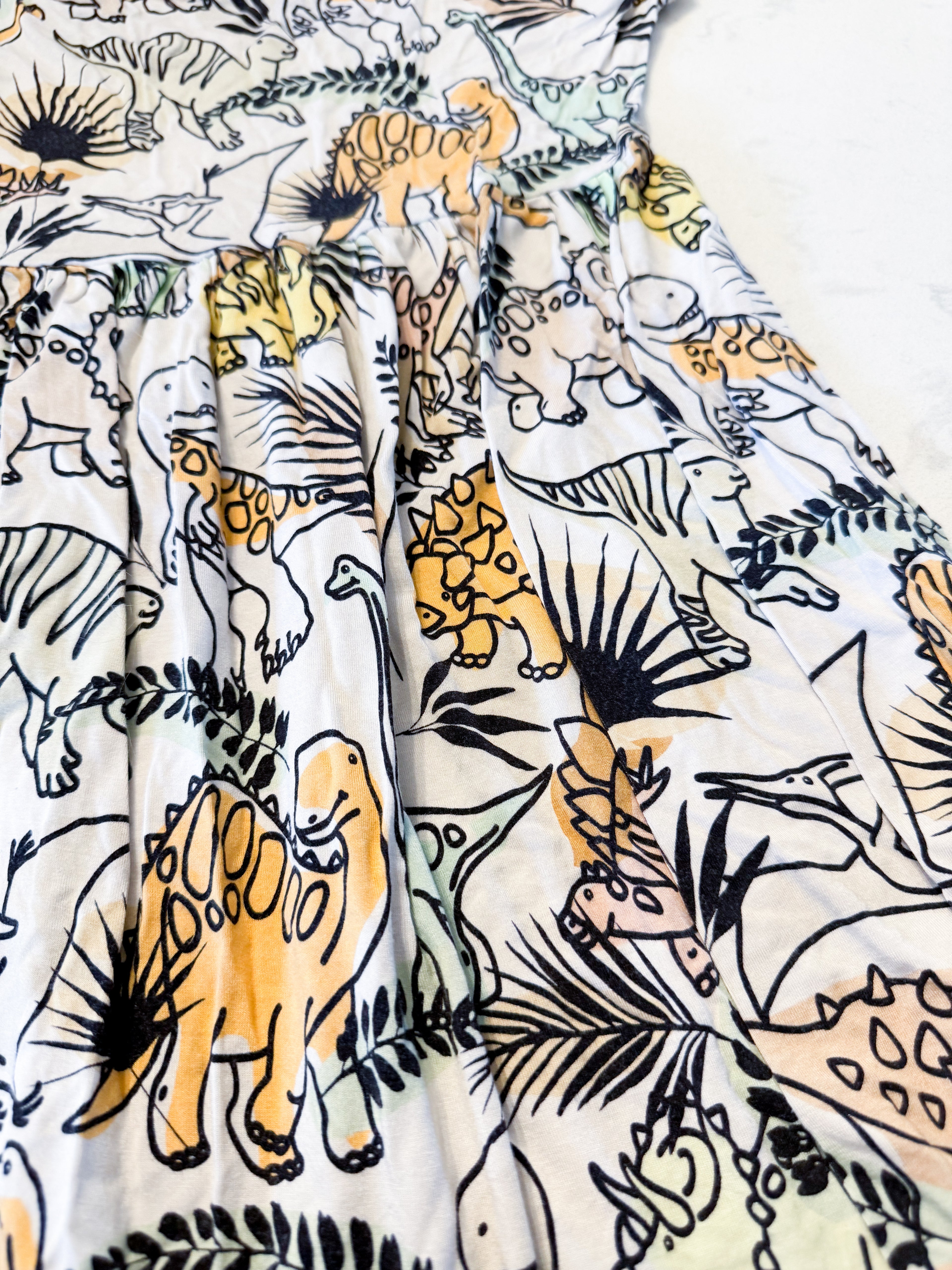 Vi and Jax- 4-5Y- VGUC- beige short sleeved bamboo dress with dinosaur pattern