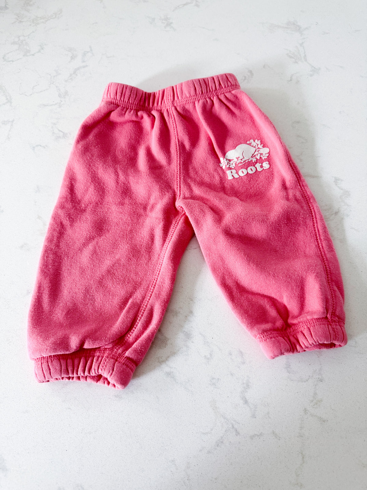 Roots- 6-12m- PLAY- bubblegum pink sweat pants with symbol