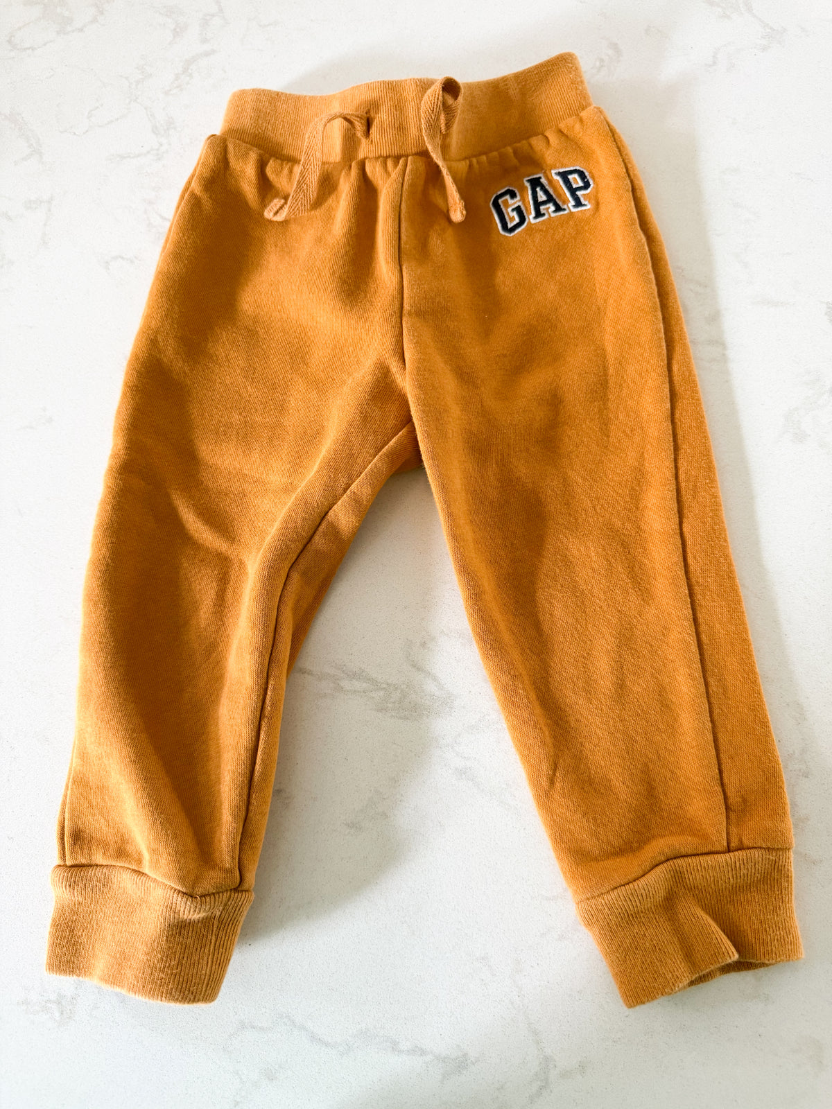 Gap- 18-24m- GUC- dark yellow sweat pants with embroidered logo