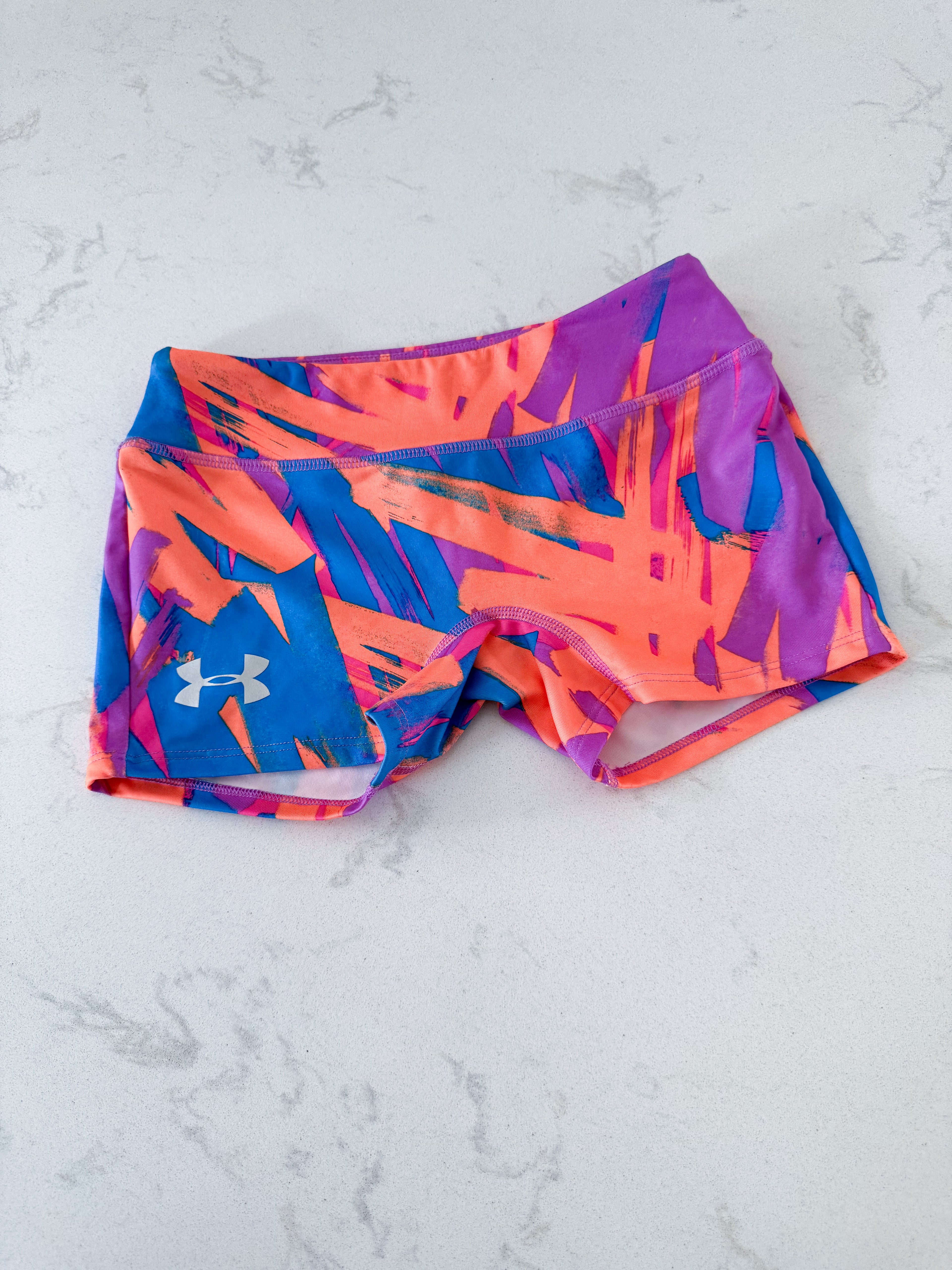 Under Armour- YMD (10-12Y)- VGUC- orange purple and blue patterns spandex shorts