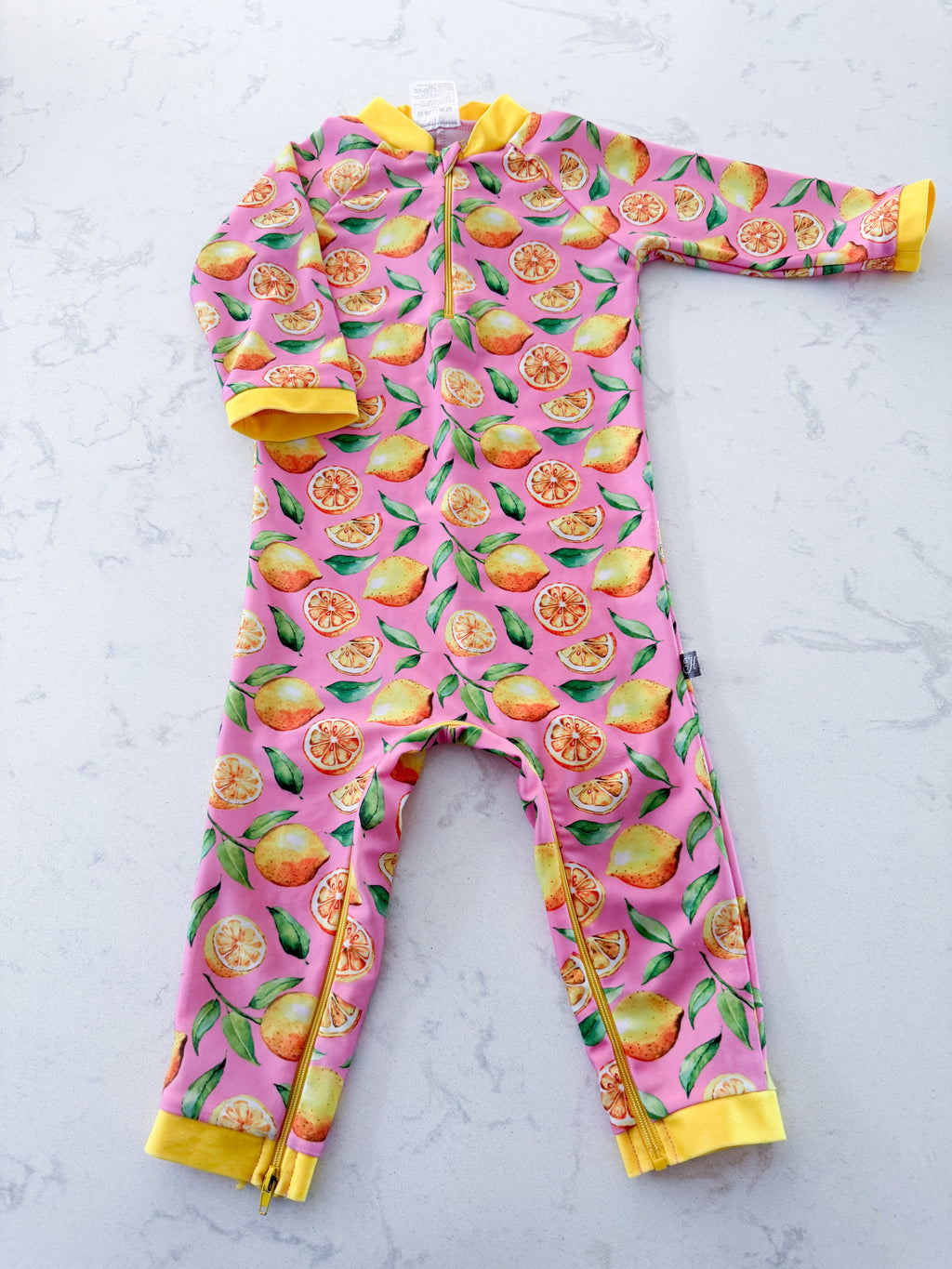 Honeysuckle Swim Co.- 18-24m- GUC- pink full coverage swim suit with lemons