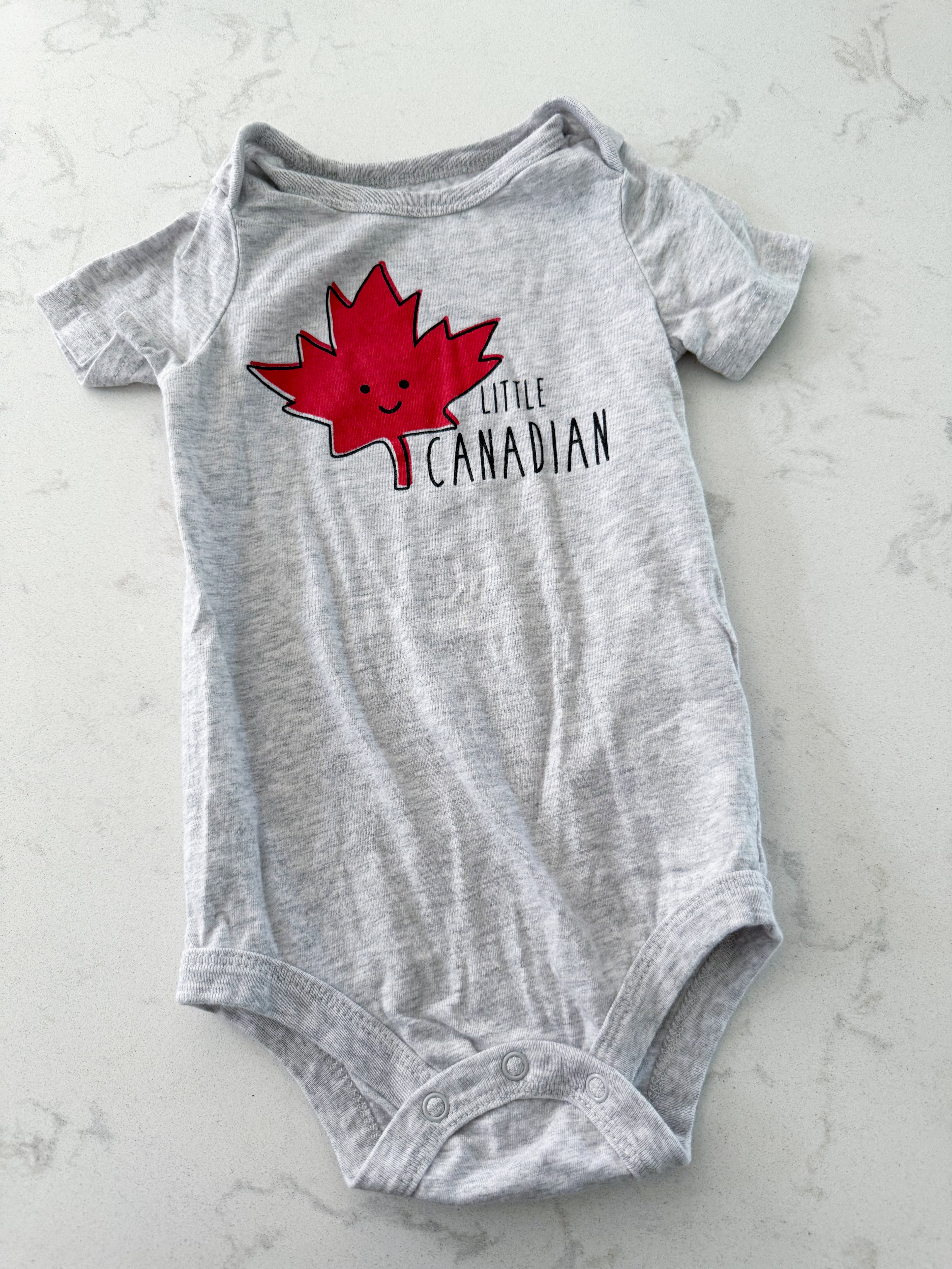 George- 18-24m- VGUC- light grey bodysuit with little Canadian graphic