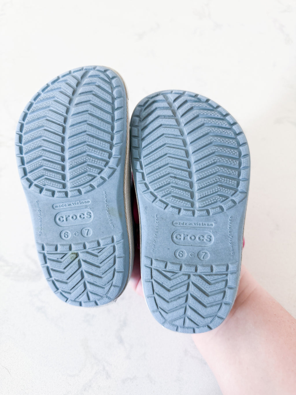 Crocs- 6/7C- GUC- light blue with pink florals slip on crocs