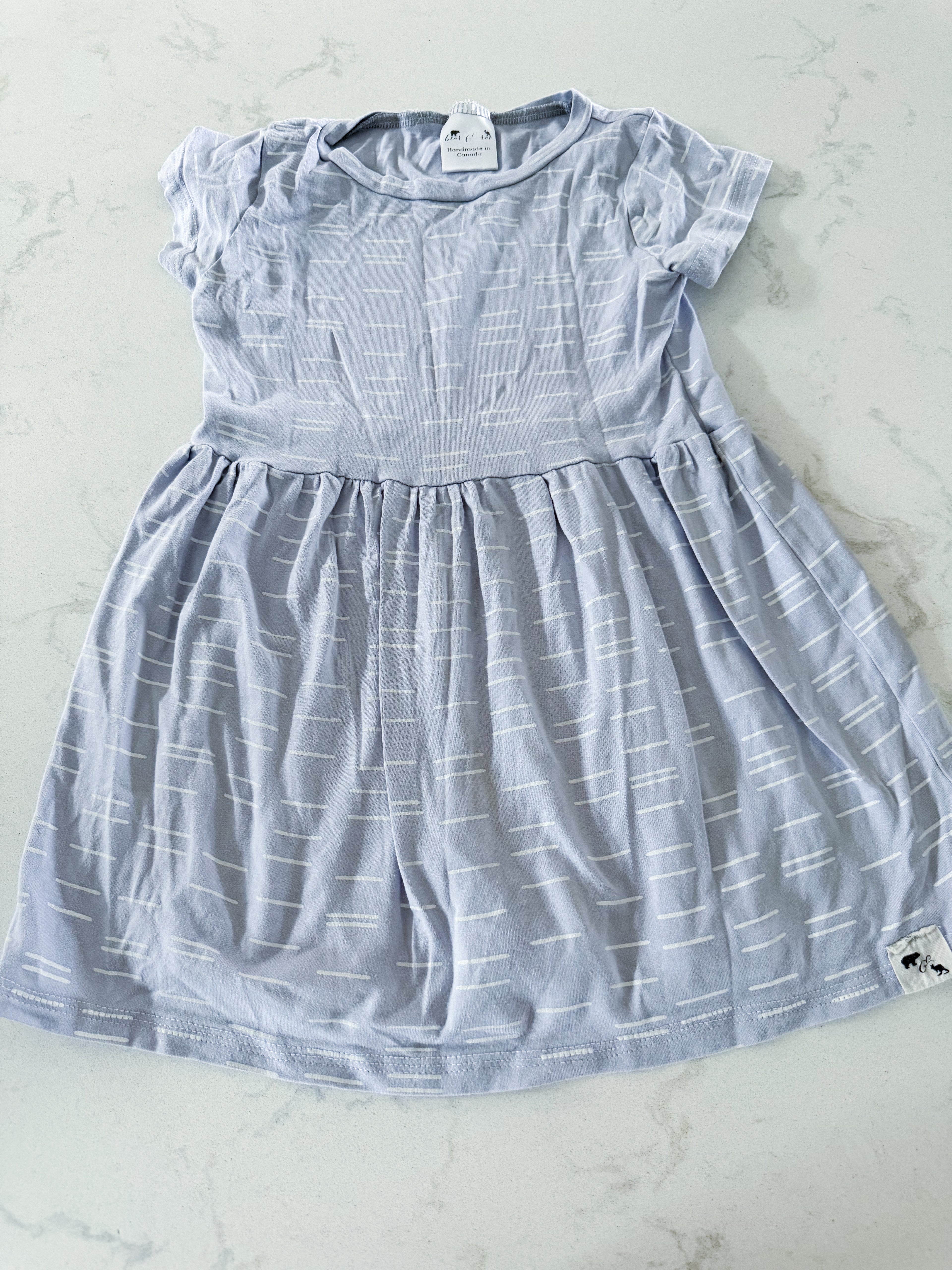 Bear & Roo- 5T- GUC- short sleeve light purple dress with dash mark pattern