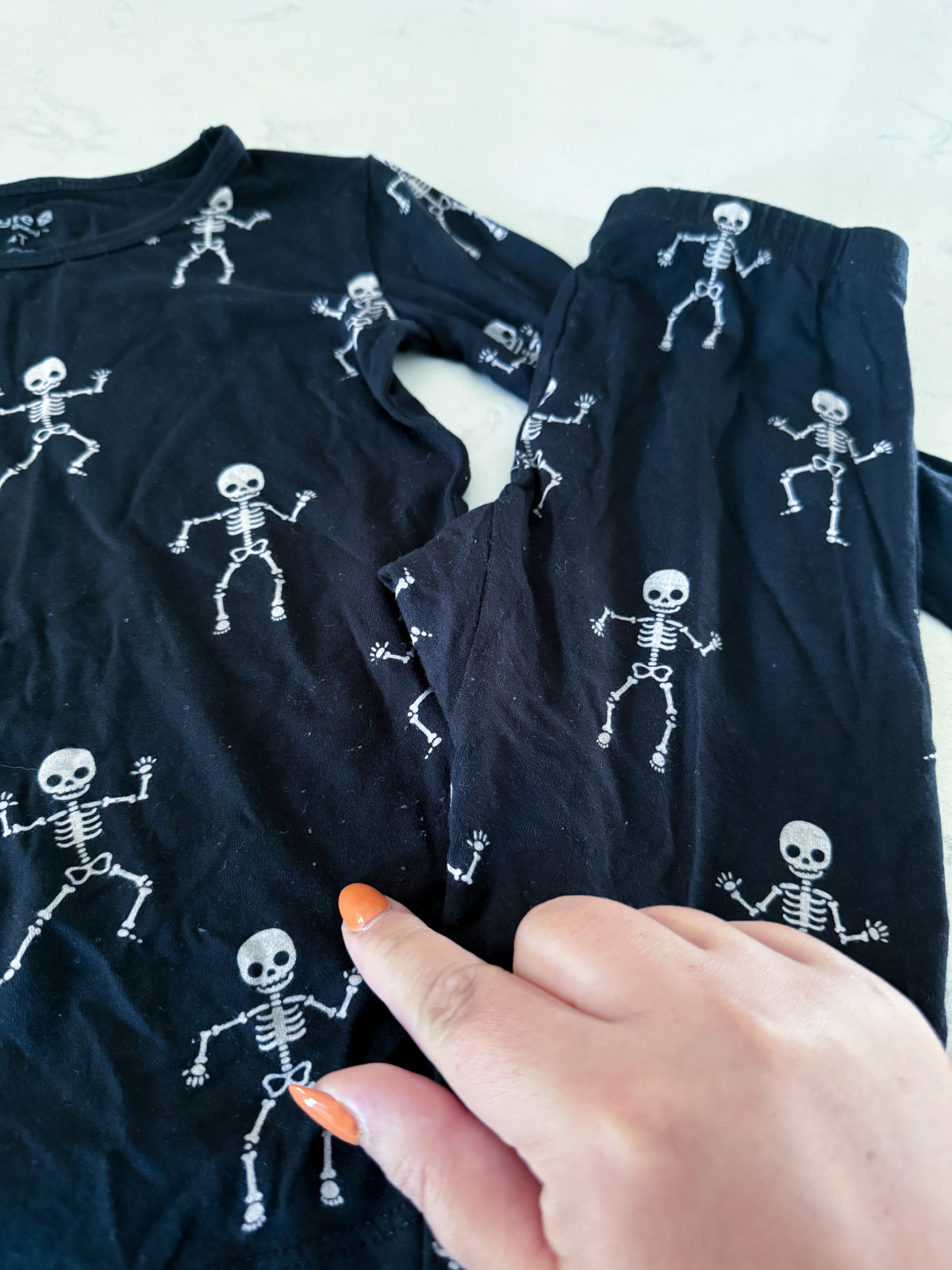 Kyte Baby- 4T- GUC- black long sleeve bamboo Jammies with skeleton graphics