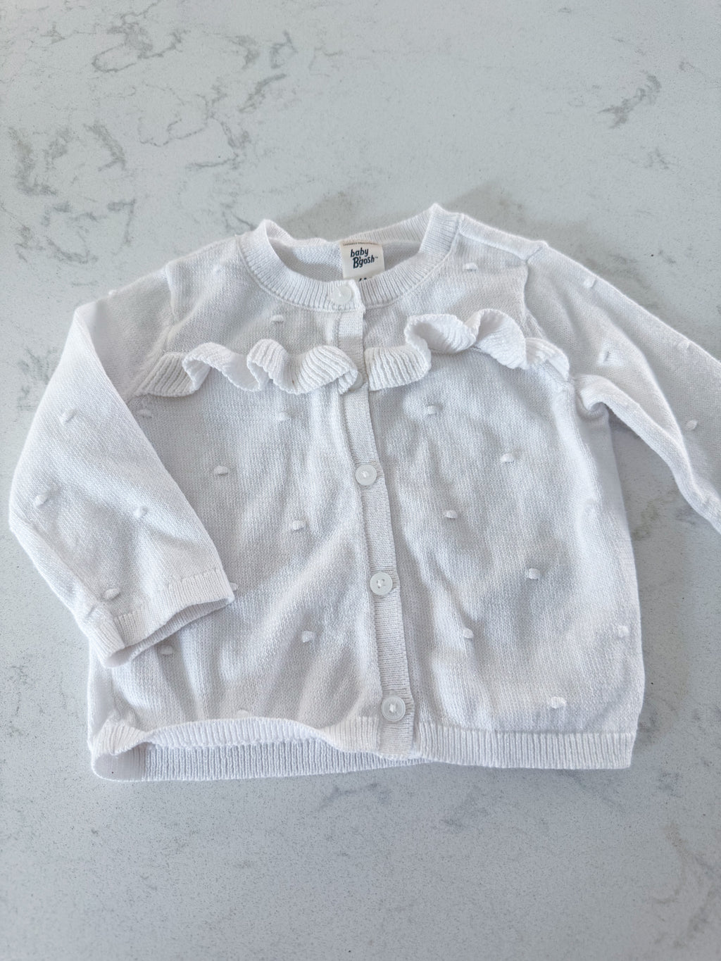 Baby B’gosh- 6m- VGUC- white sparkly knit cardigan with raised bumps and ruffles