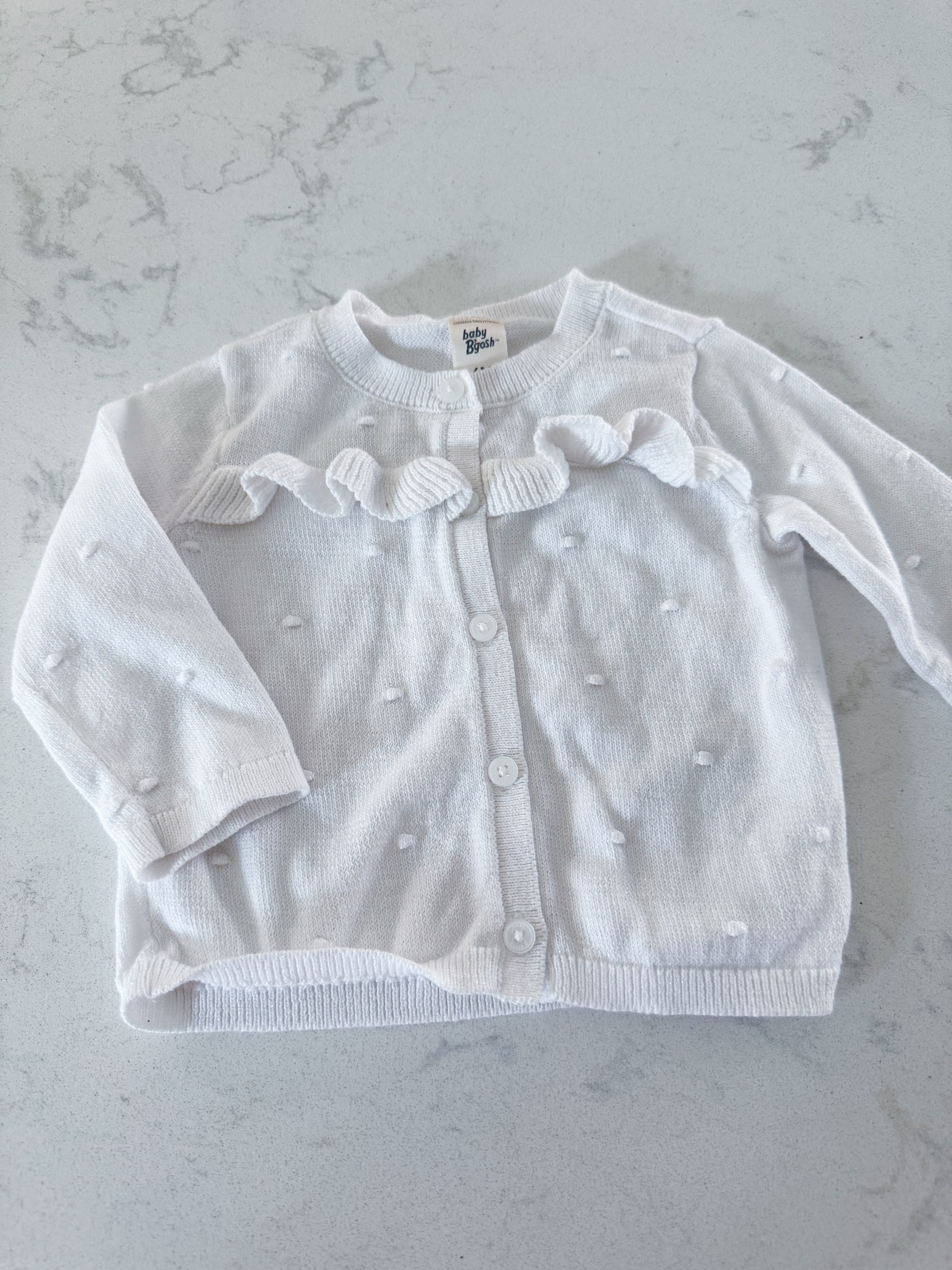Baby B’gosh- 6m- VGUC- white sparkly knit cardigan with raised bumps and ruffles