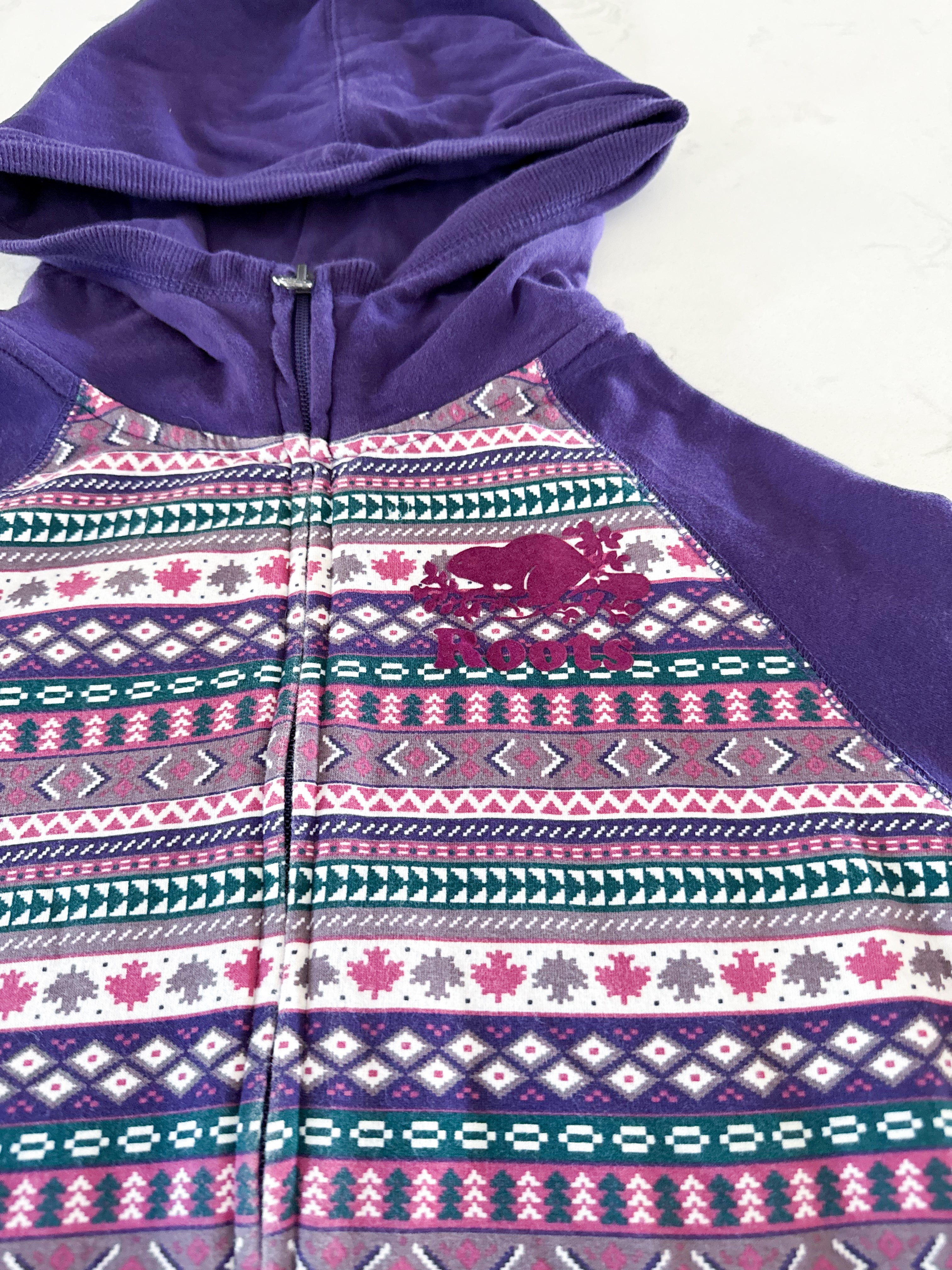 Roots- 11-12Y- GUC- purple patterned zip up with medium purple logo