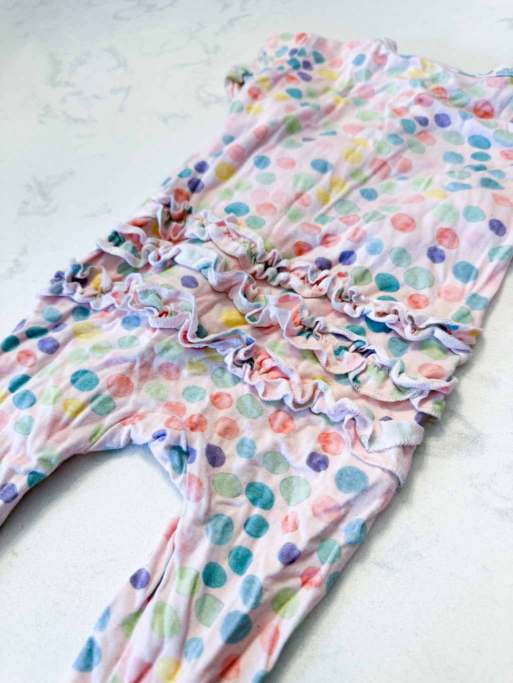 Posh Peanut- 3-6m- GUC- light pink bamboo footie pajamas with ruffle bum and zipper