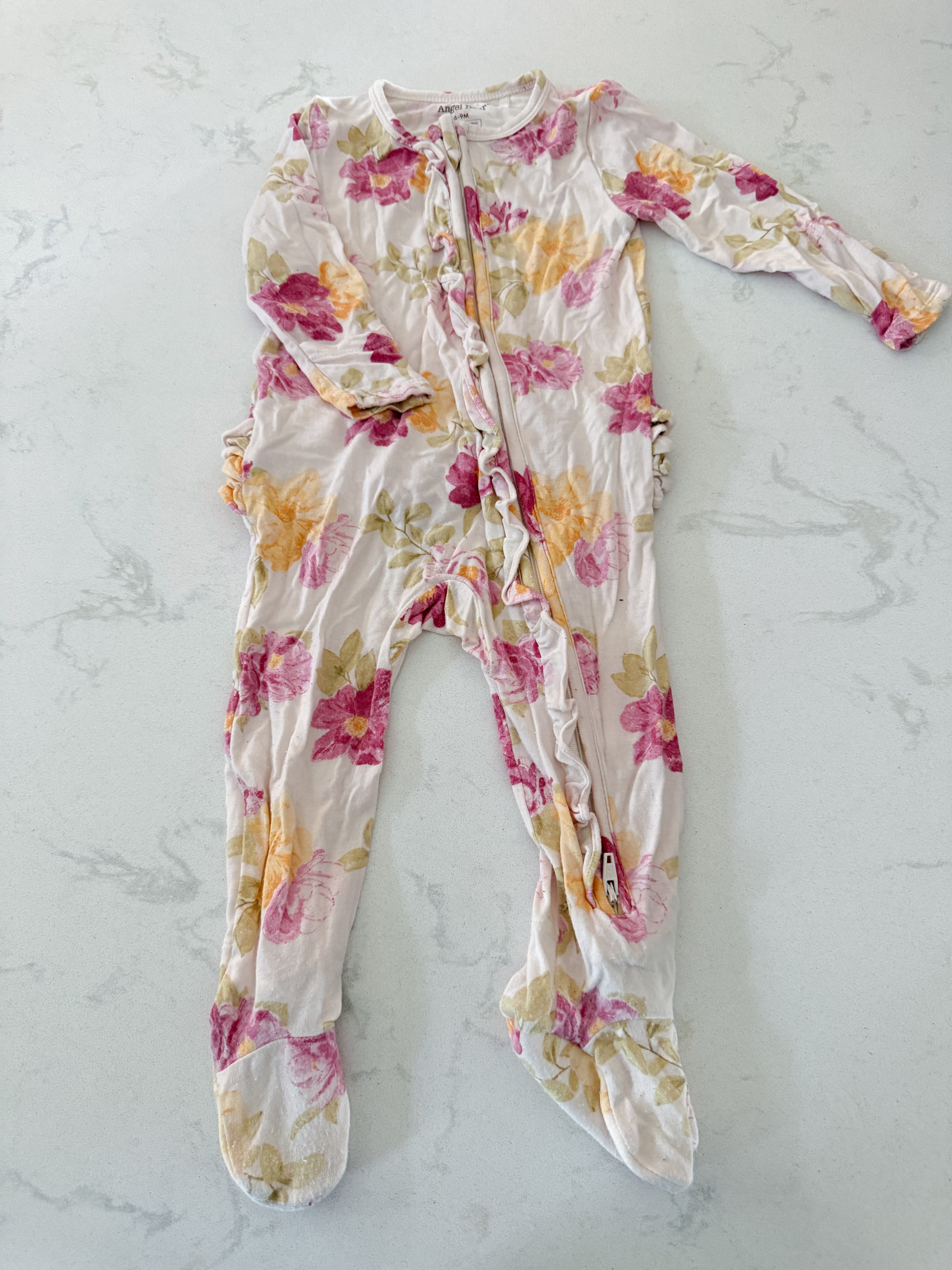 Angel Dear- 6-9m- GUC- cream coloured bamboo jammies with pink yellow florals and ruffle bum