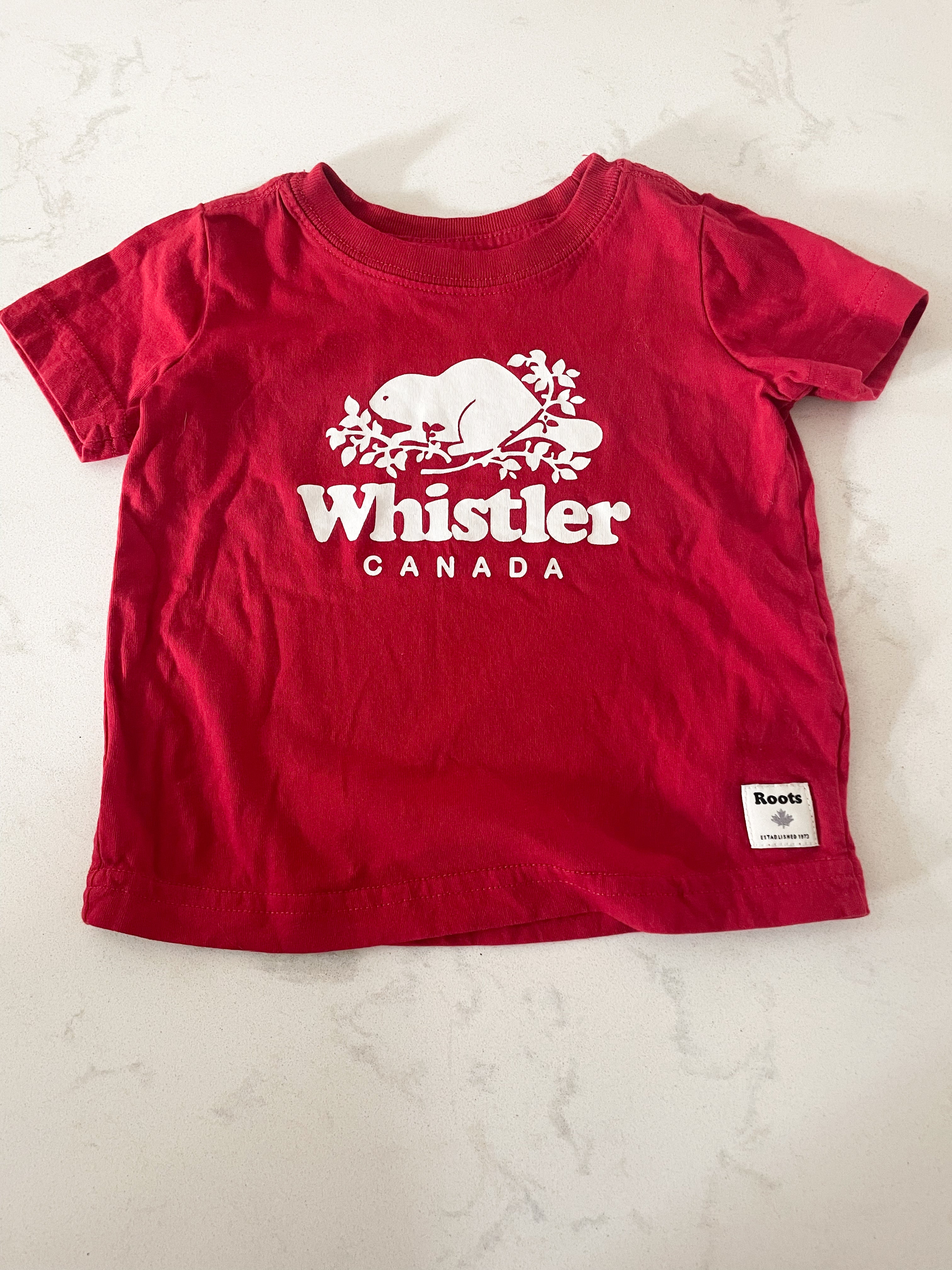 Roots-6-12m-VGUC- red t-shirt with logo and whistler