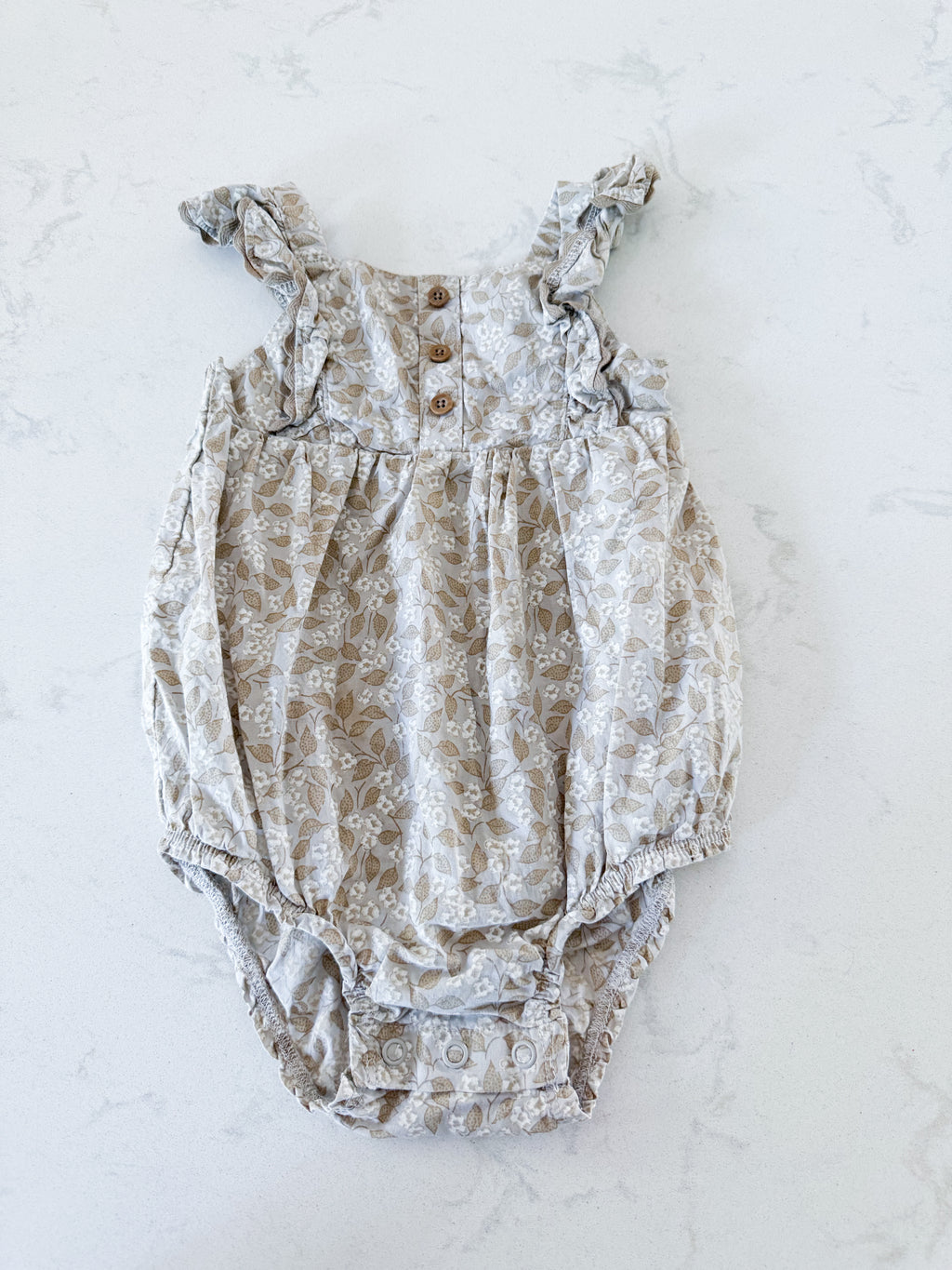 Carters- 12m- VGUC- grey beige tank bodysuit with tiny florals and leaves