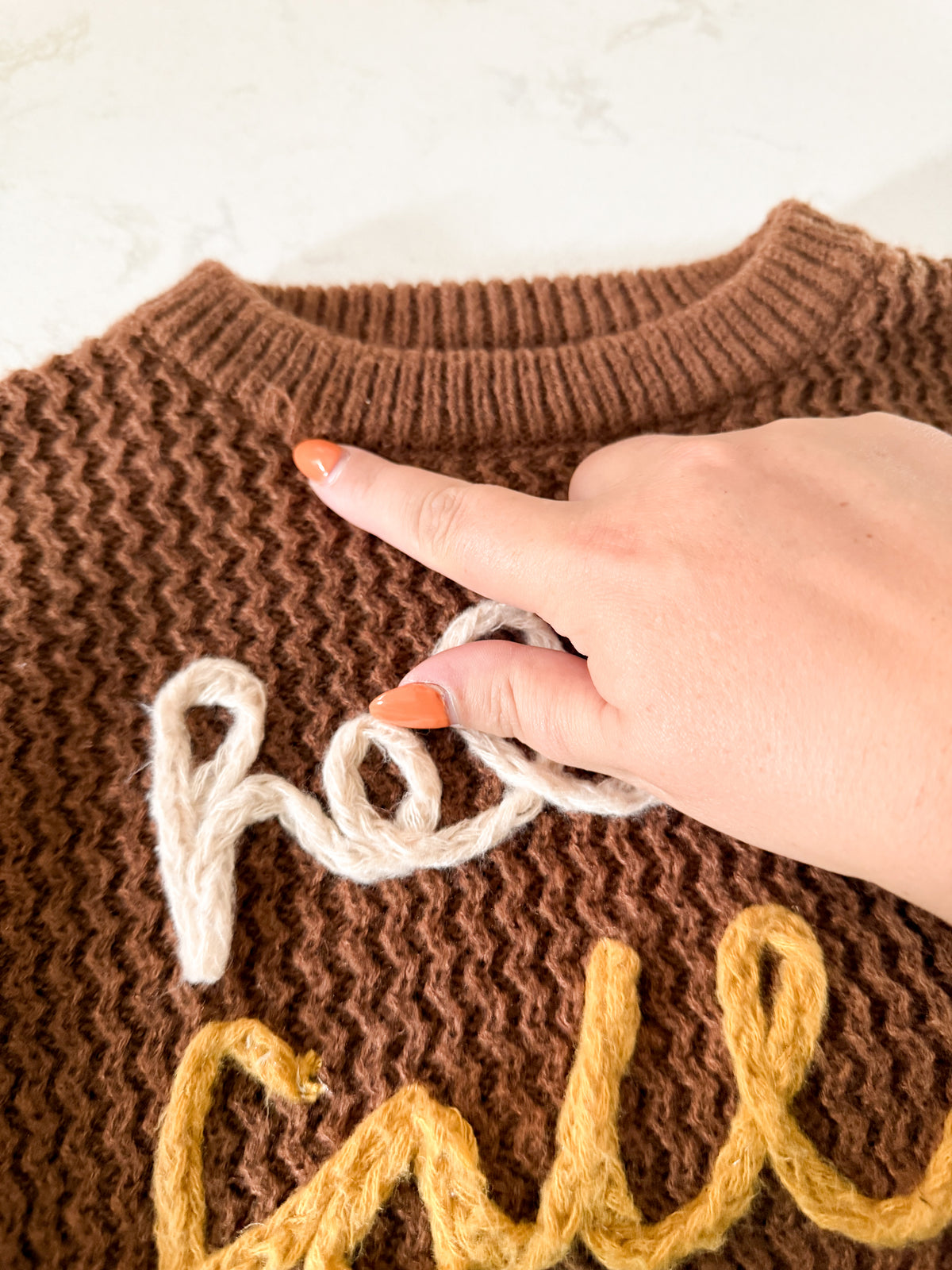 No brand (homemade)- 4-5T- GUC- brown knit crewneck with knit lettering “hello fall”