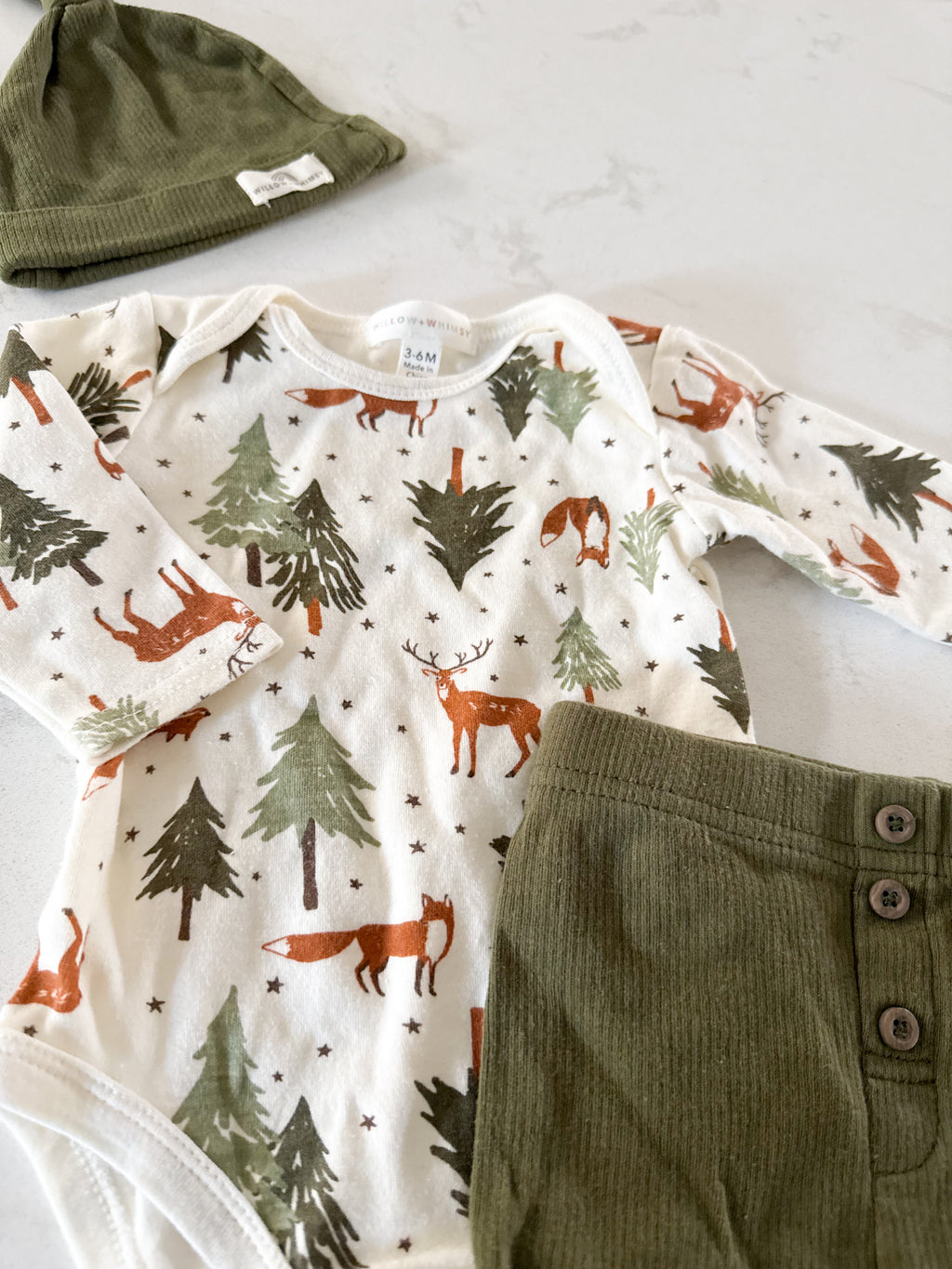 Willow and Whimsy- 3-6m- GUC- olive green ribbed outfit with woodland animals