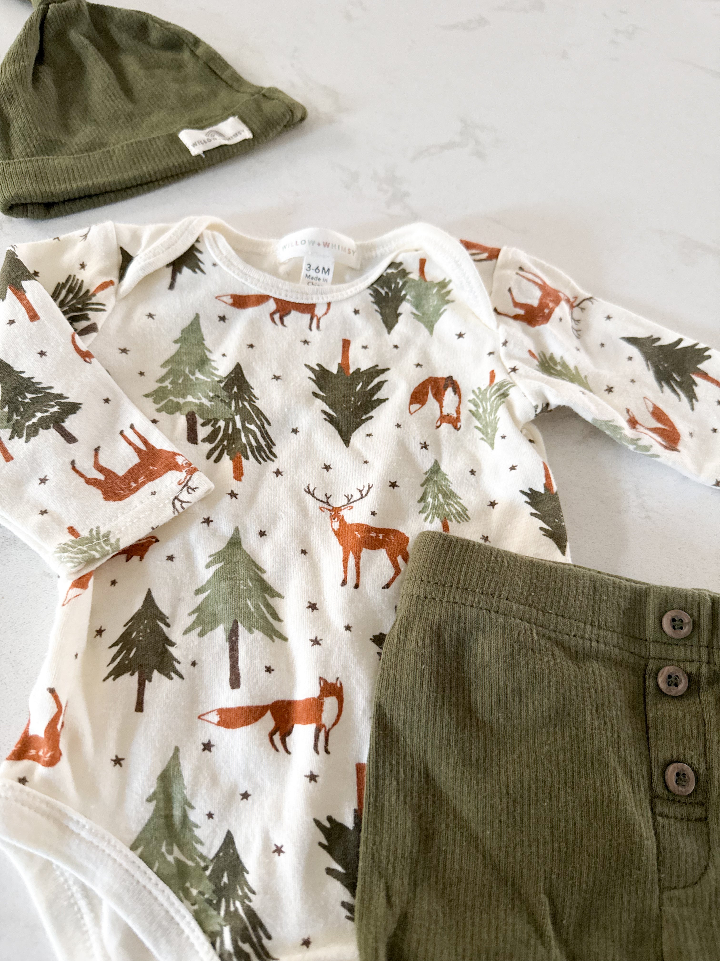 Willow and Whimsy- 3-6m- GUC- olive green ribbed outfit with woodland animals