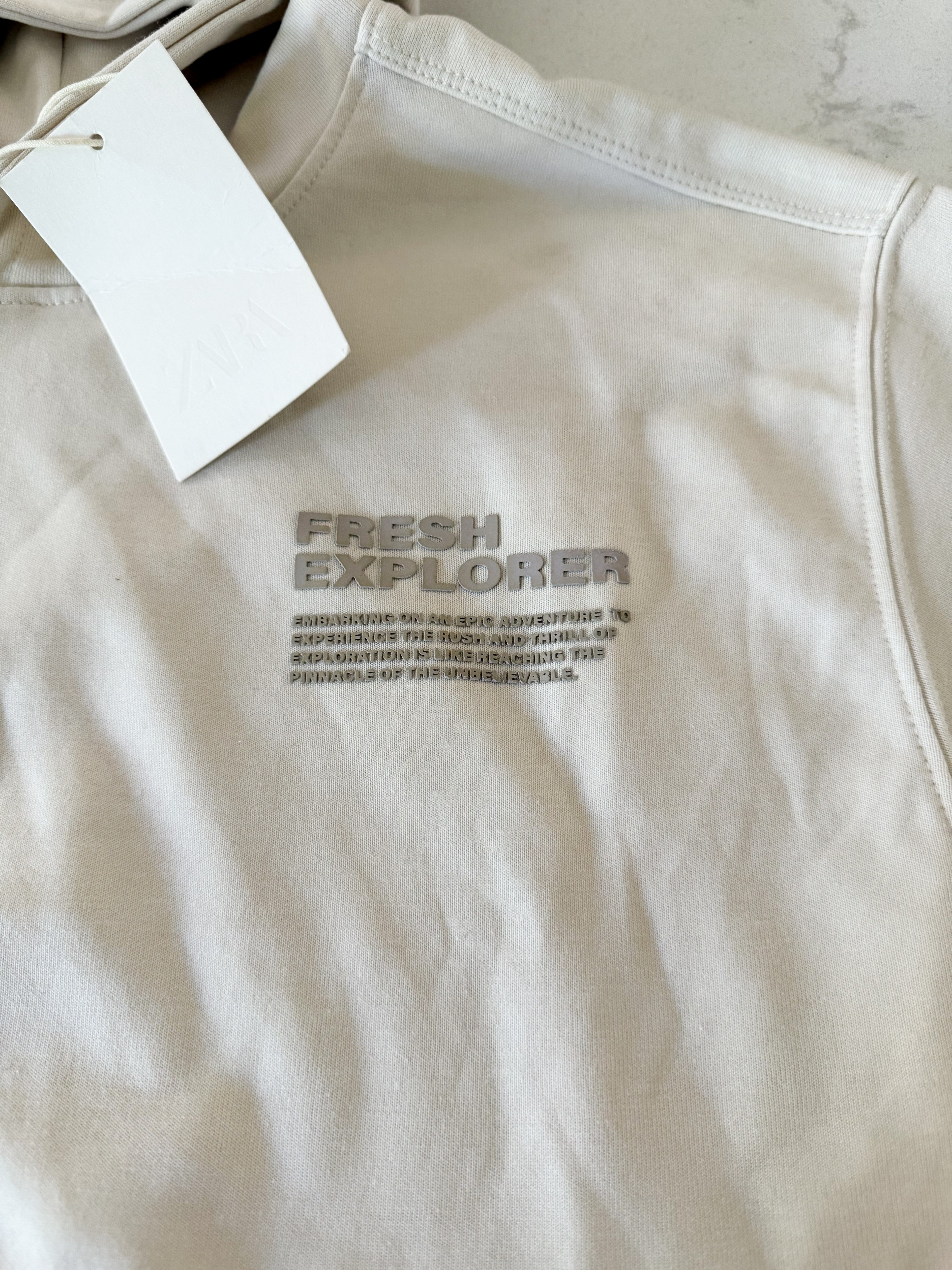 Zara- 11-12Y- BNWT- beige short sleeve hooded shirt with print