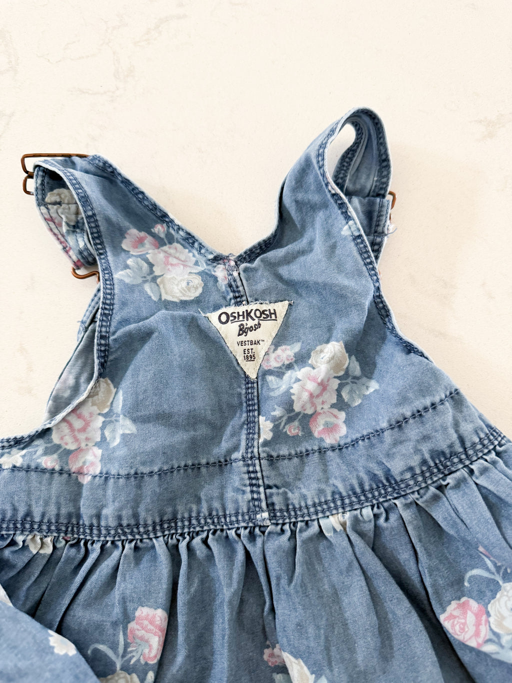 Oshkosh- 12-18m- GUC- thin Jean look overalls with floral pattern