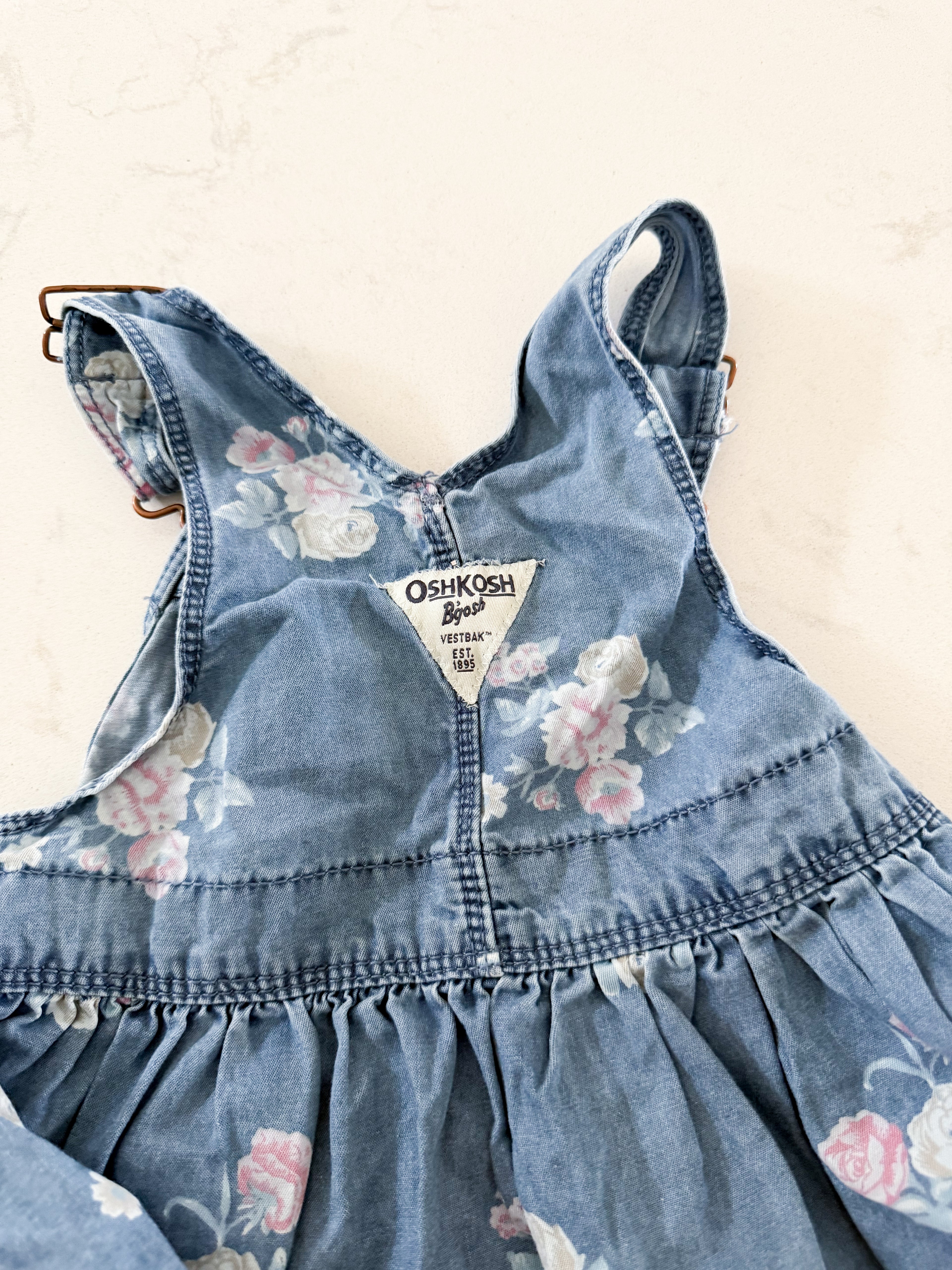Oshkosh- 12-18m- GUC- thin Jean look overalls with floral pattern