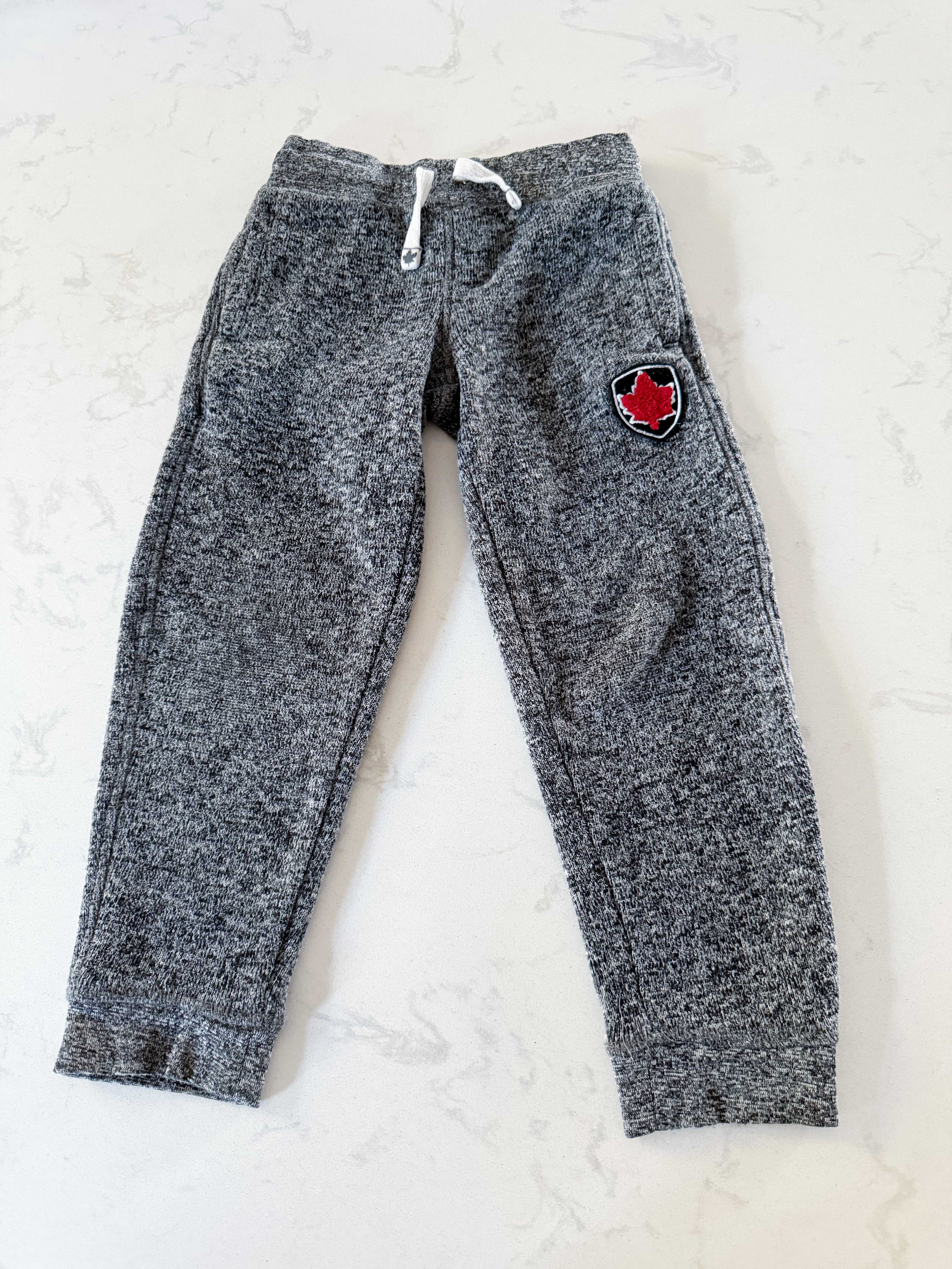 Canadiana- 4-5T- GUC- Grey speckled sweats with embroidered maple leaf