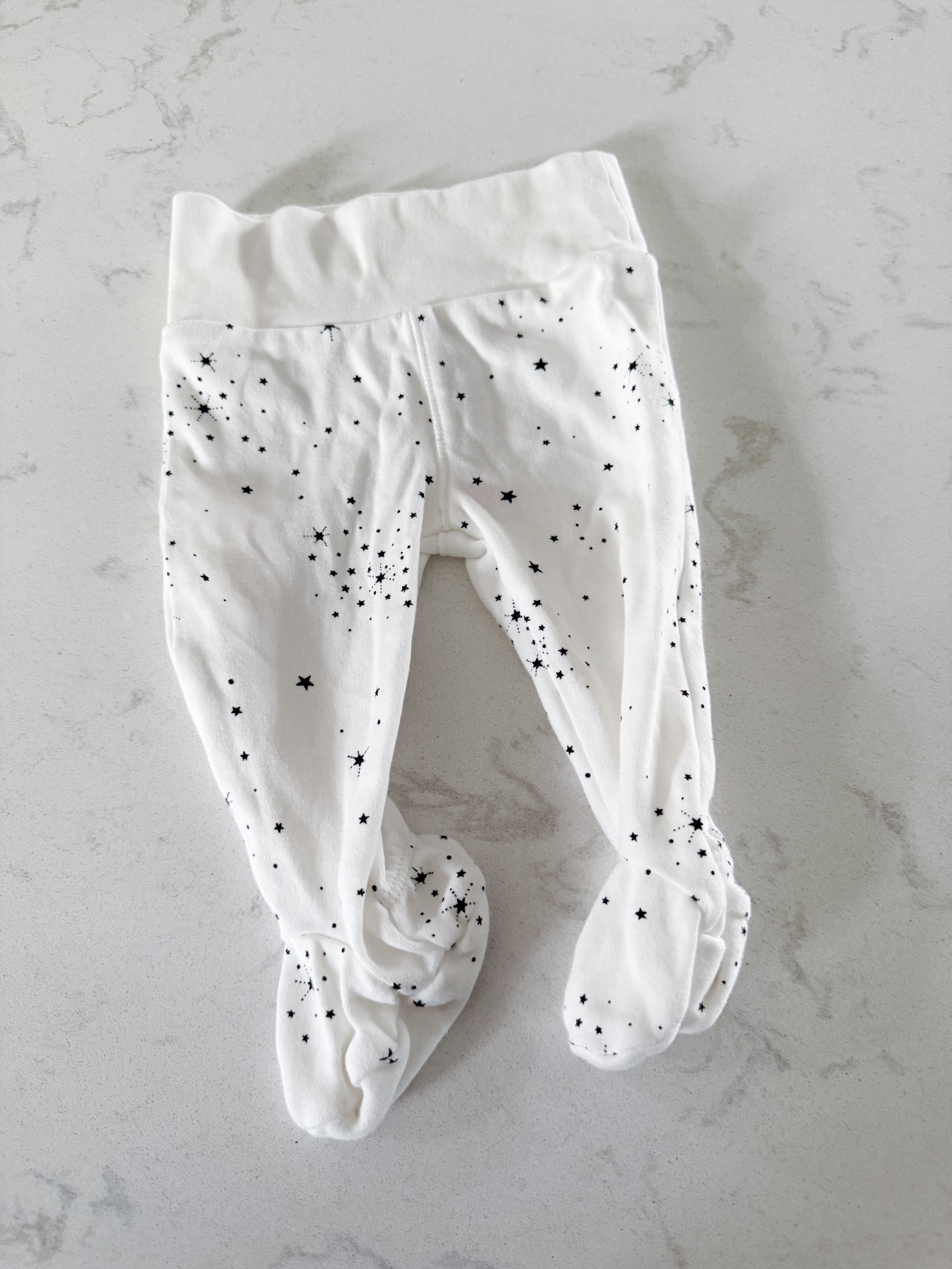 Petit lem- 3m- VGUC- footed pants with black minimalist stars