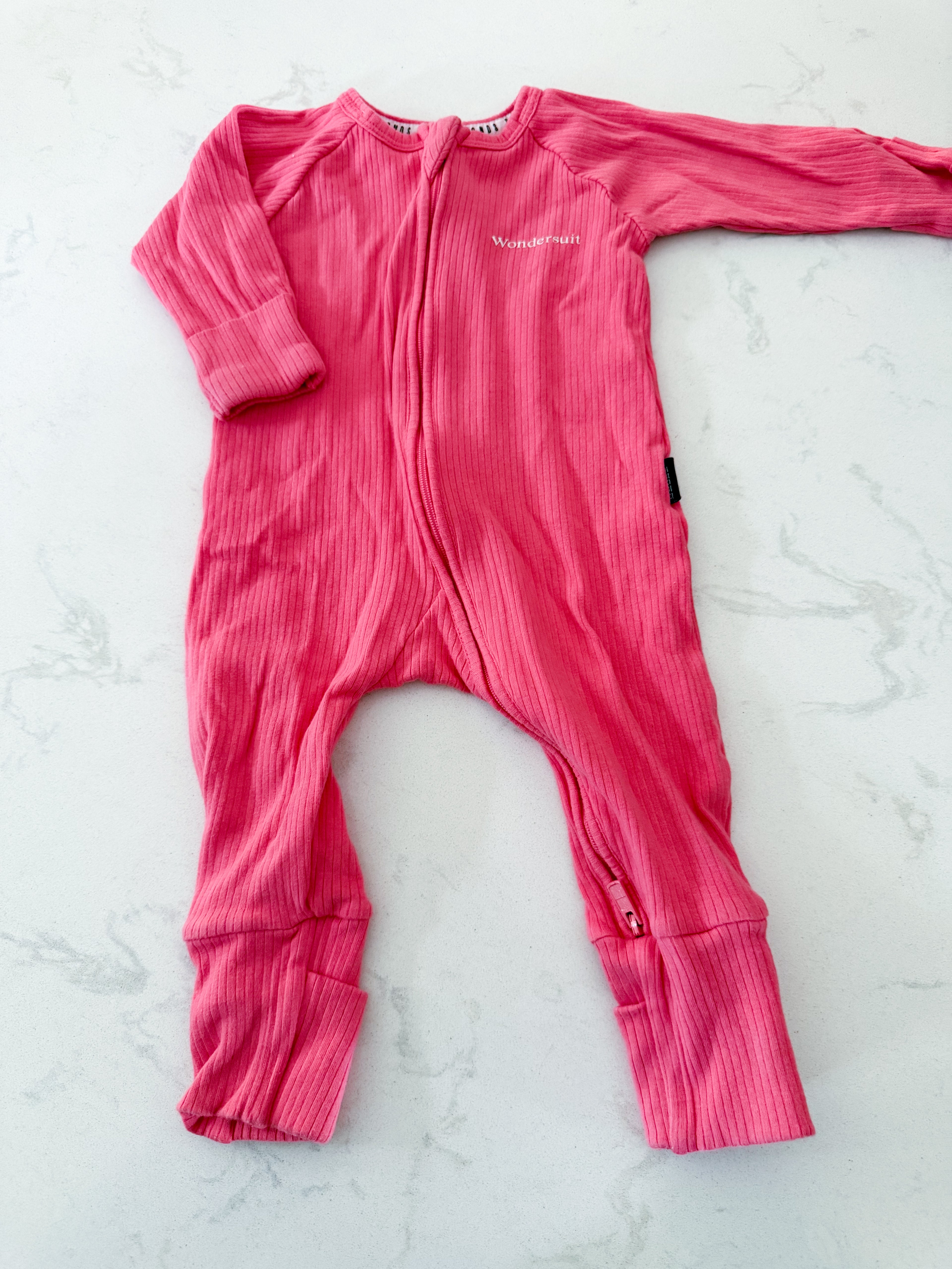 Wondersuit- size 00 (3-6m)- GUC- pink ribbed romper jammies