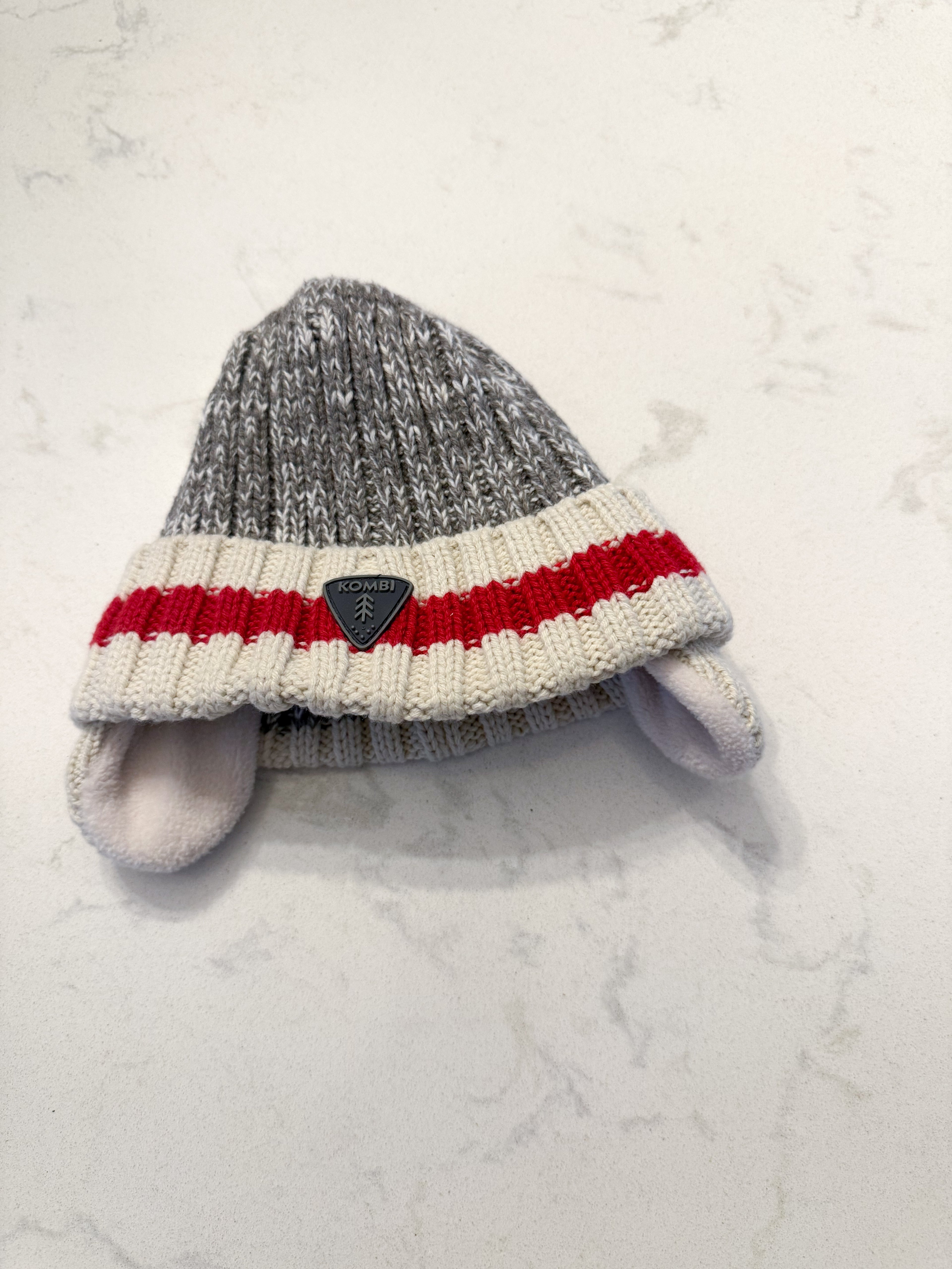 Kombi- 3-9m- VGUC- knit fleece lined hat with ear covers