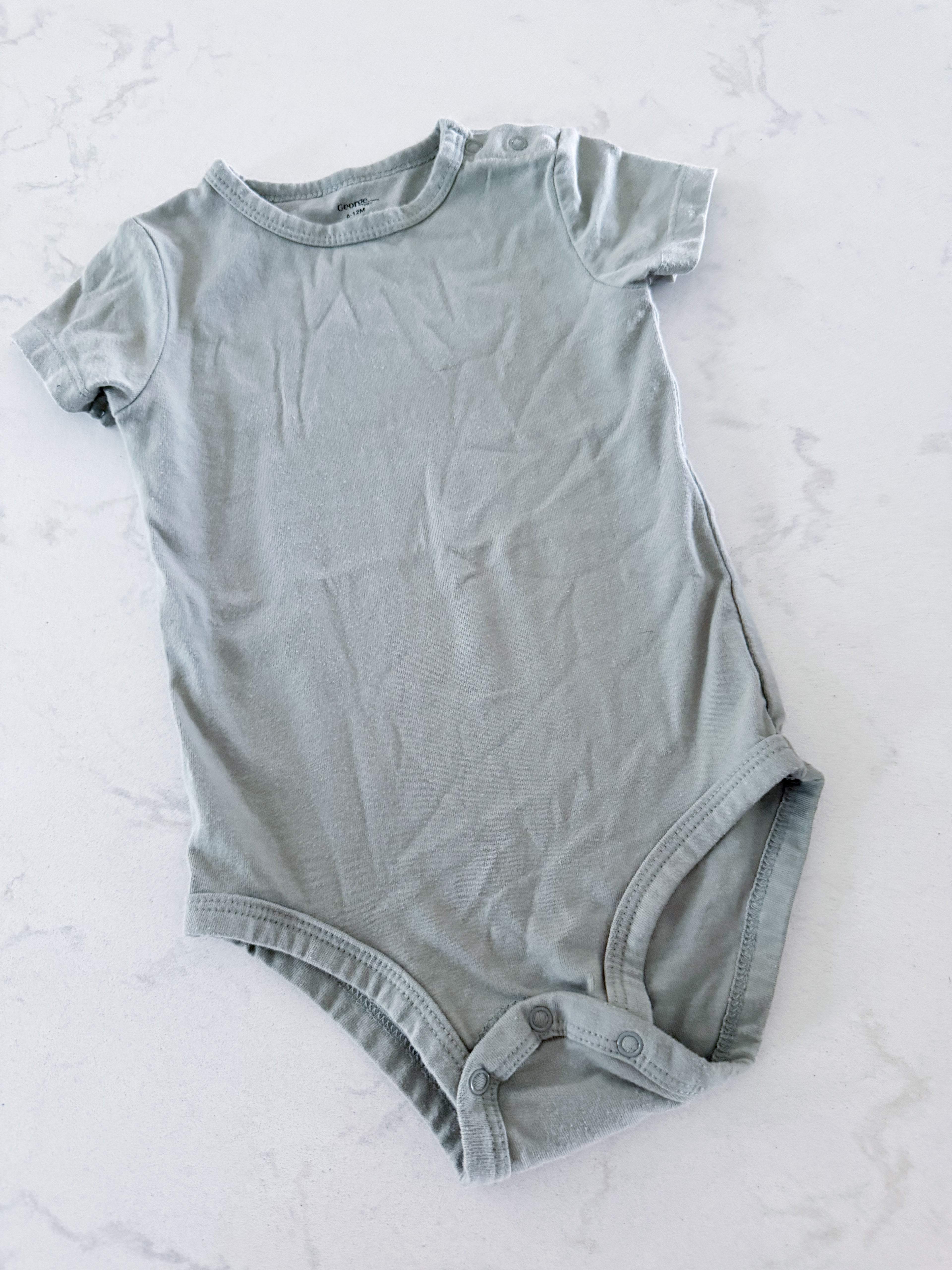 George- 6-12m- GUC- sage green short sleeve bodysuit