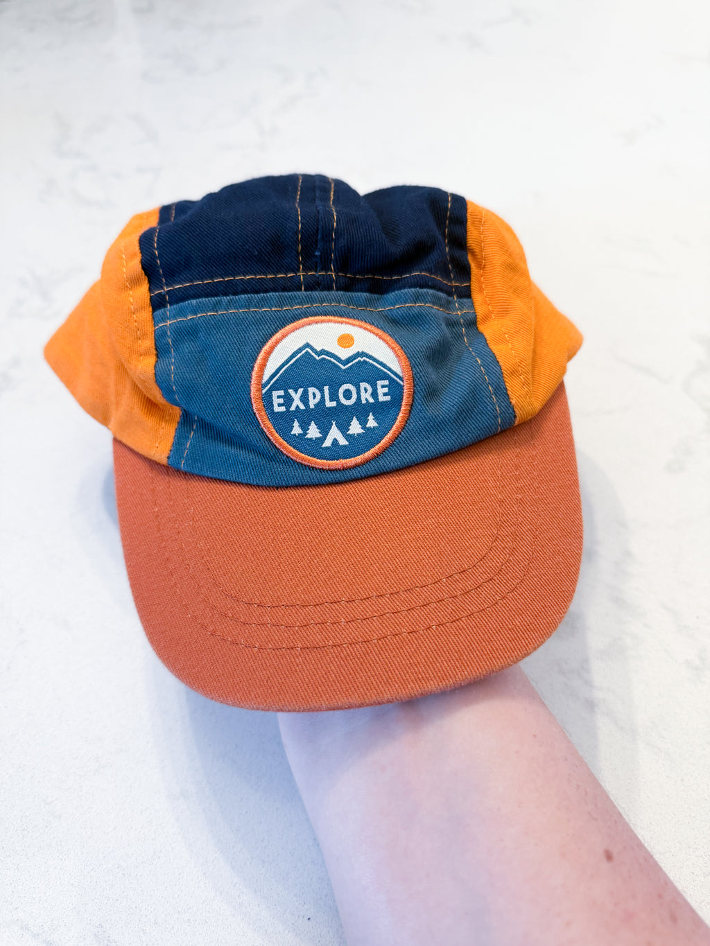 Black Mountain- 47cm (under 2 years)- VGUC- orange green and navy adjustable hat