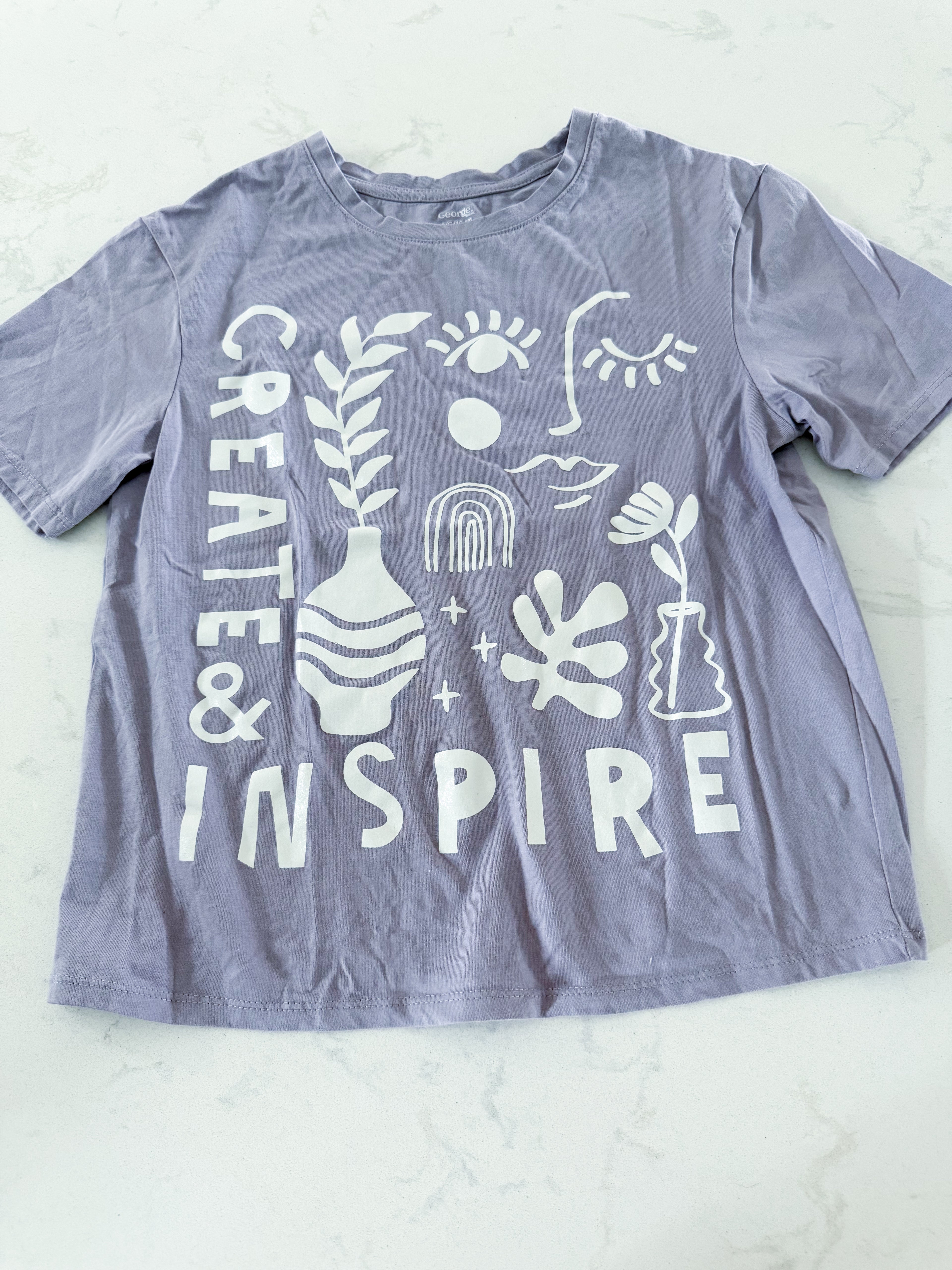 George- 10-12Y- VGUC- light purple f shirt with sparkly white graphics