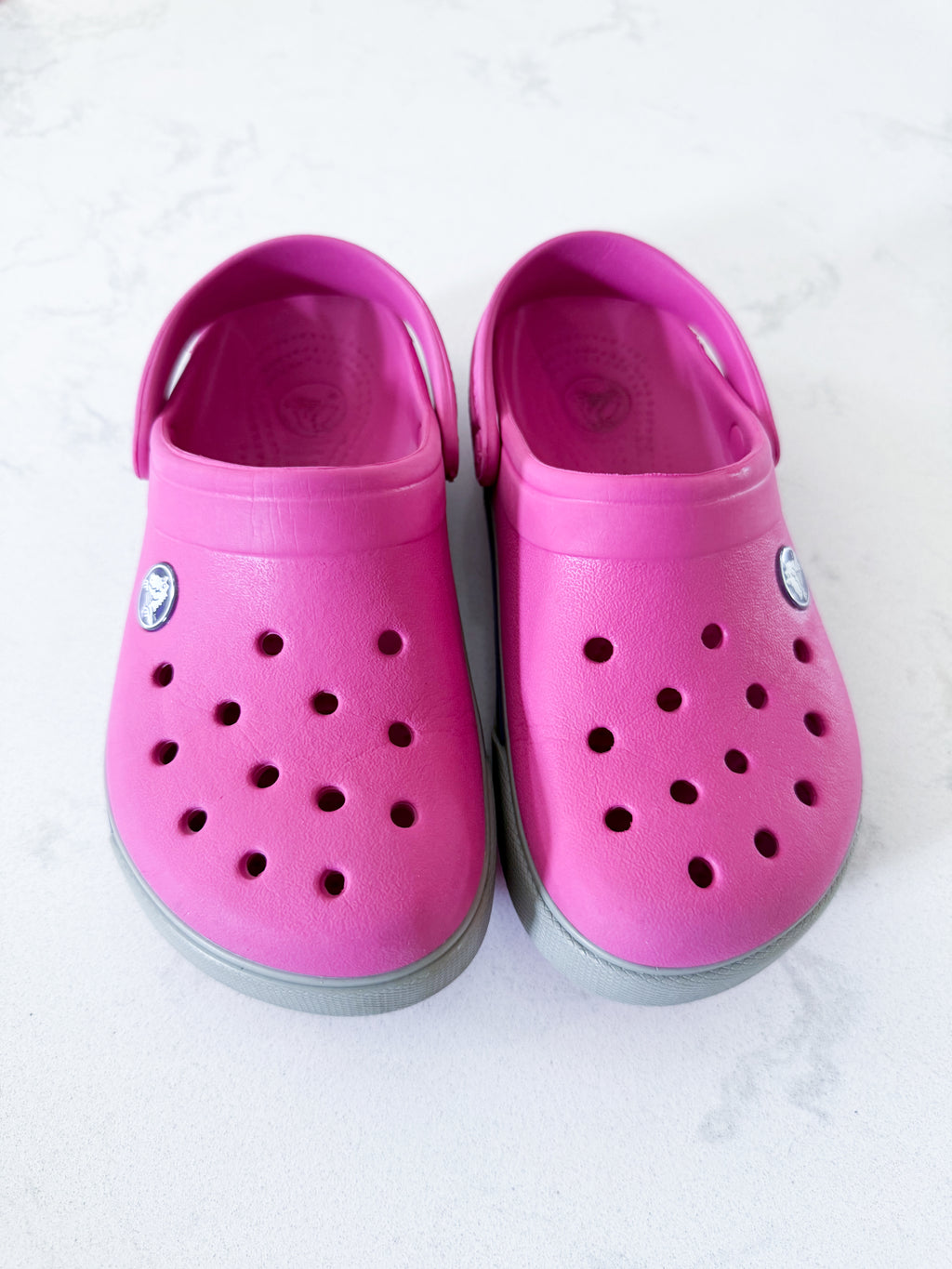 Crocs- 12/13C- GUC- pink crocs with grey trim
